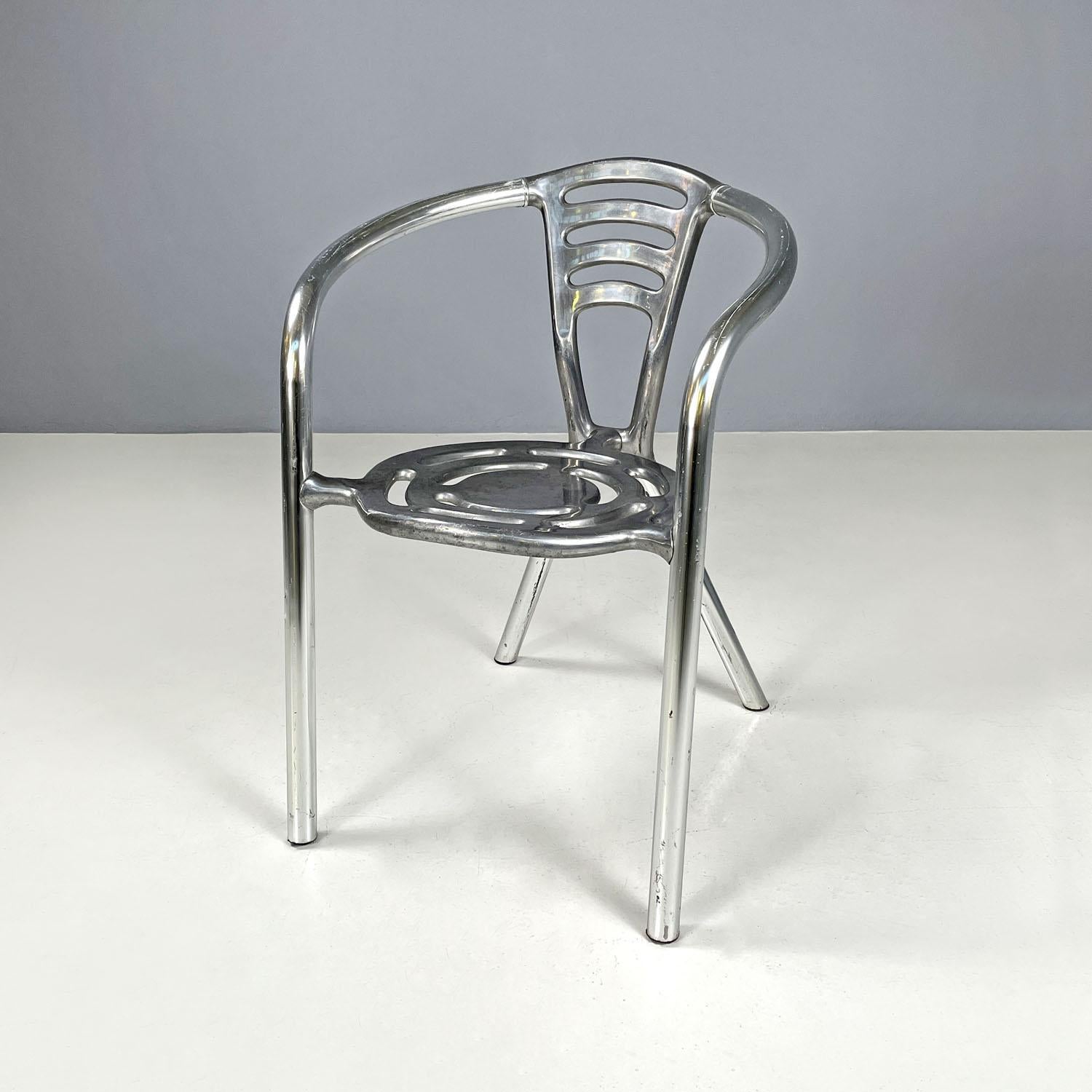 Italian postmodern aluminum chair Ferdinand Alexander Porsche for Ycami, 1990s
Aluminum chair with round seat. The seat and backrest have decorative perforations with curved lines. The structure of the armrests and legs is made of an aluminum tube.