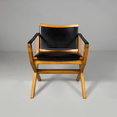 Italian postmodern armchair Kiu in wood and black leather for Luxoritalia, 2020s