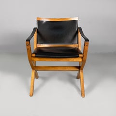 Italian postmodern armchairs Kiu in wood and black leather for Luxoritalia 2020s