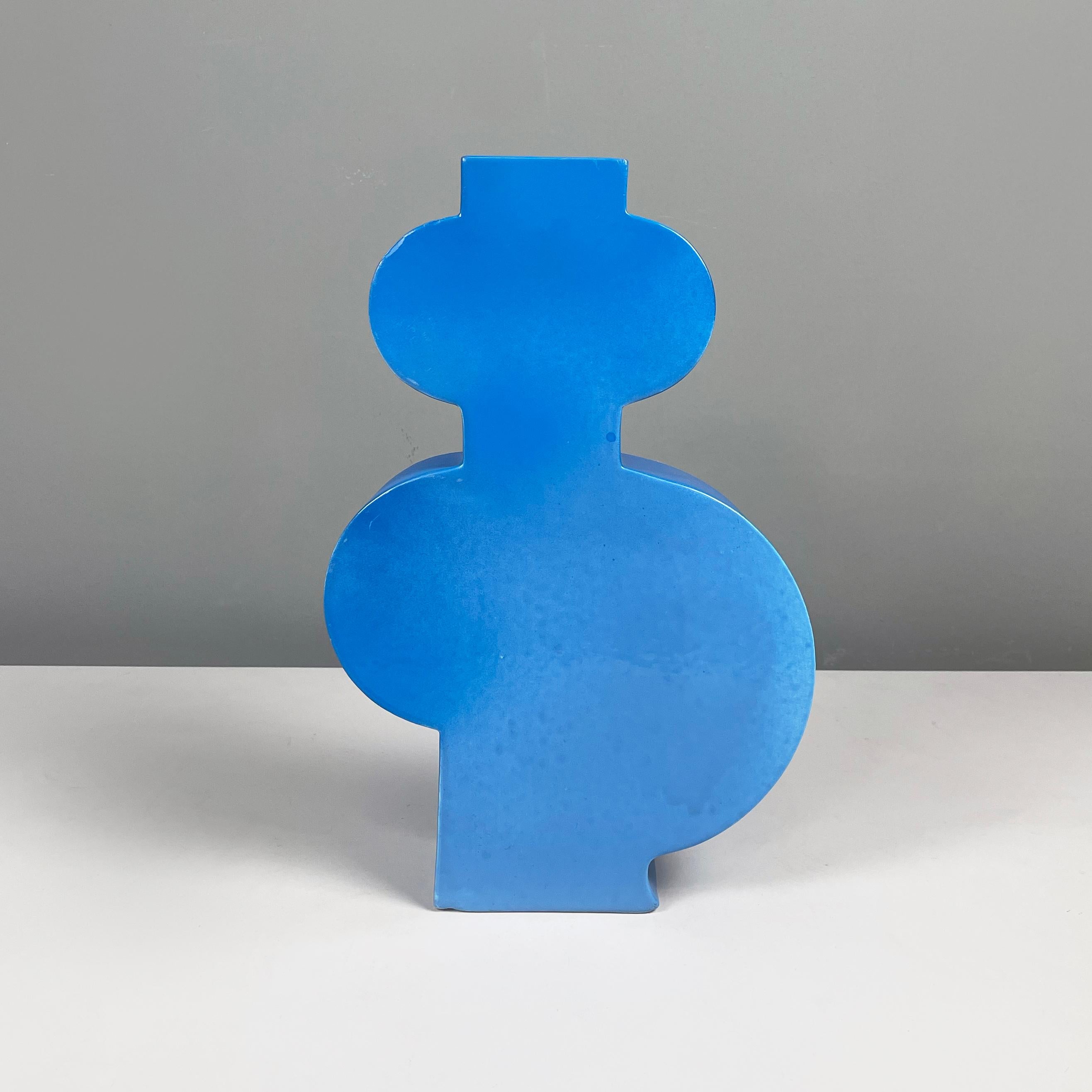 Italian postmodern Blue ceramic sculpture by Florio Pac Paccagnella, 2023
Blue vitrified ceramic sculpture with glossy finish. The subject of the sculpture is geometric and sinuous. The sculpture can also be used as a vase as it has a square hole in