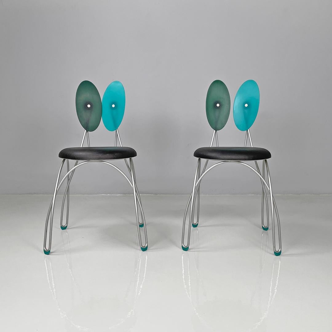 Italian postmodern chairs Jessica by D'Urbino & Lomazzi for Zerodisegno, 1990s
Pair of chairs model Jessica in silver painted metal rod. The structure is made up of a single intertwined rod, the seat is round in black rubber and the backrest has two