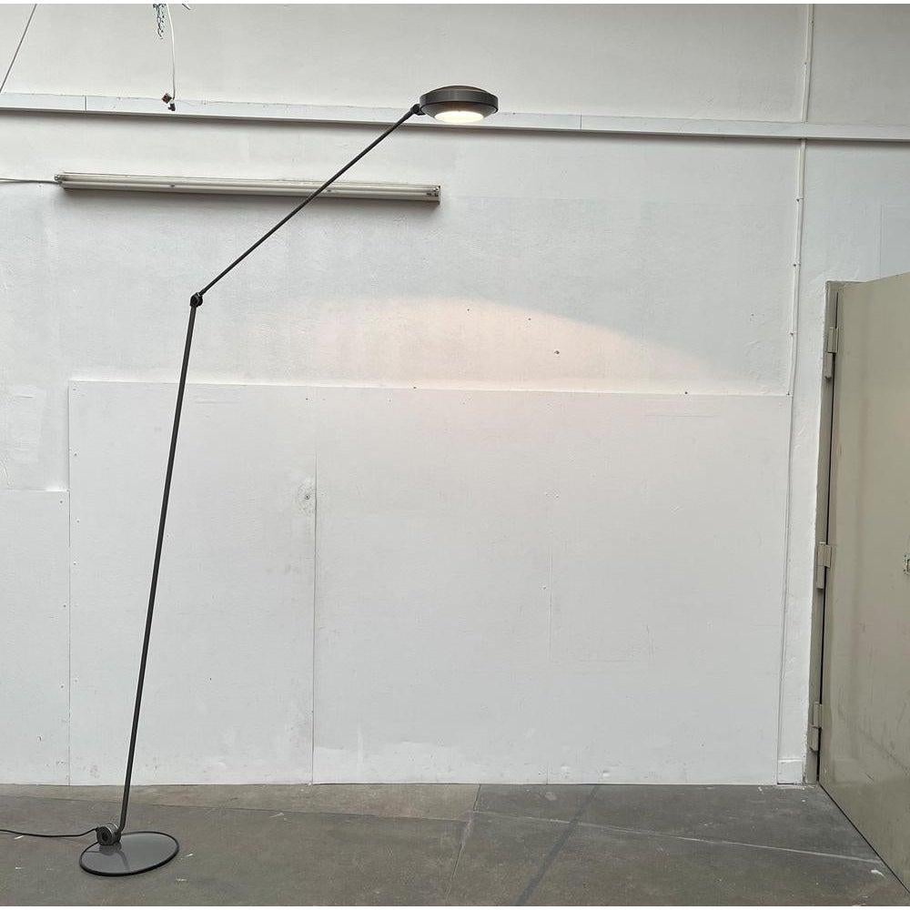 Postmodern floor lamp from the Italian manufacturer Lumina according to a design by Tommaso Cimini from the 80s. Here is a rare version with a special version.

An impressive yet filigree design. Imposing through the everything that is outstanding