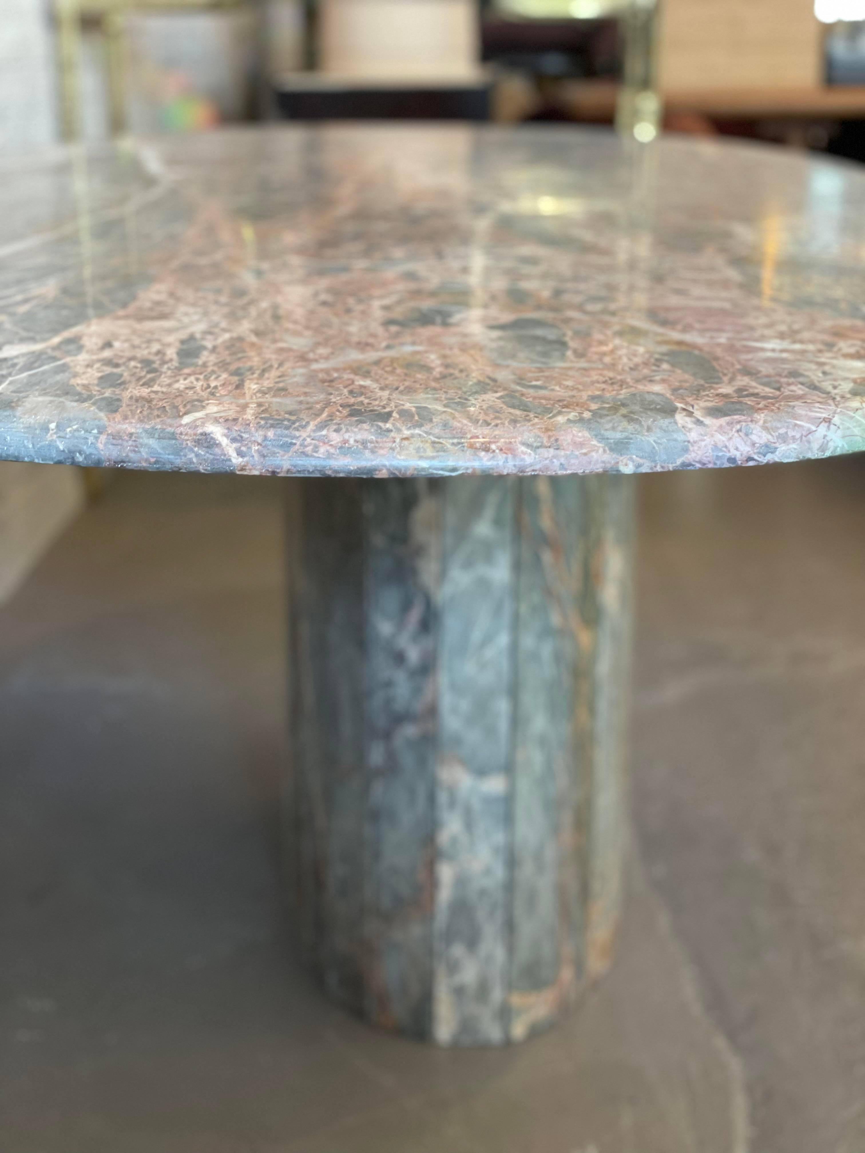 Unbelievably stunning. This table is grey and a multitude of pastel colors but primarily peach/pink. I had the lacquer coating professionally removed and sealed in a satin finish. Not too shiny, not too dull. From the 1970s to now…it’s beyond