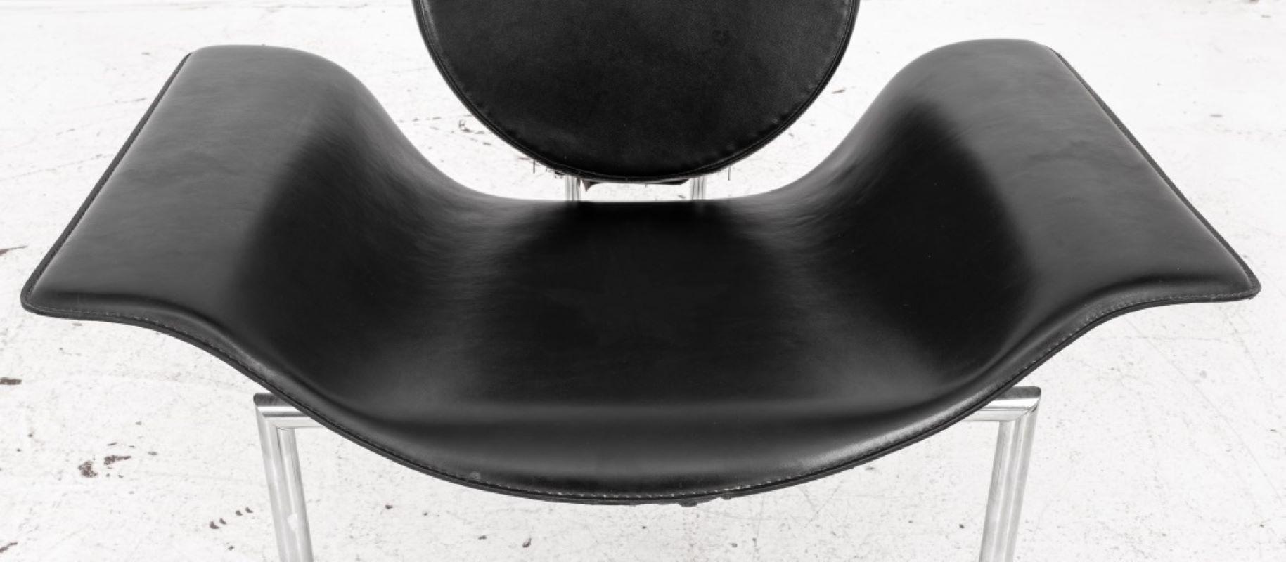 Italian postmodern leather and steel armchair, 1980s, round suspended black leather back above a rectangular molded 