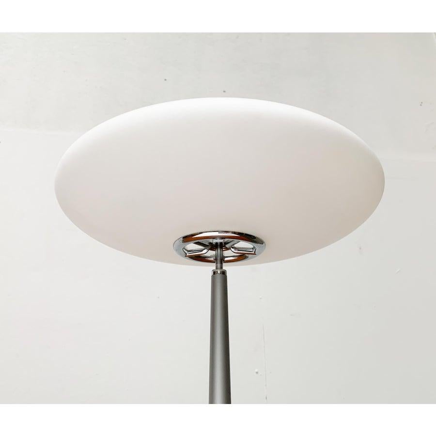 The large T2 table lamp version from the Pao lamp series by Matteo Thun. Here in a rare version in chrome and silver.

The Pao lamps impress with their characteristic diffuser and base made of frosted glass. However, it is rather the material