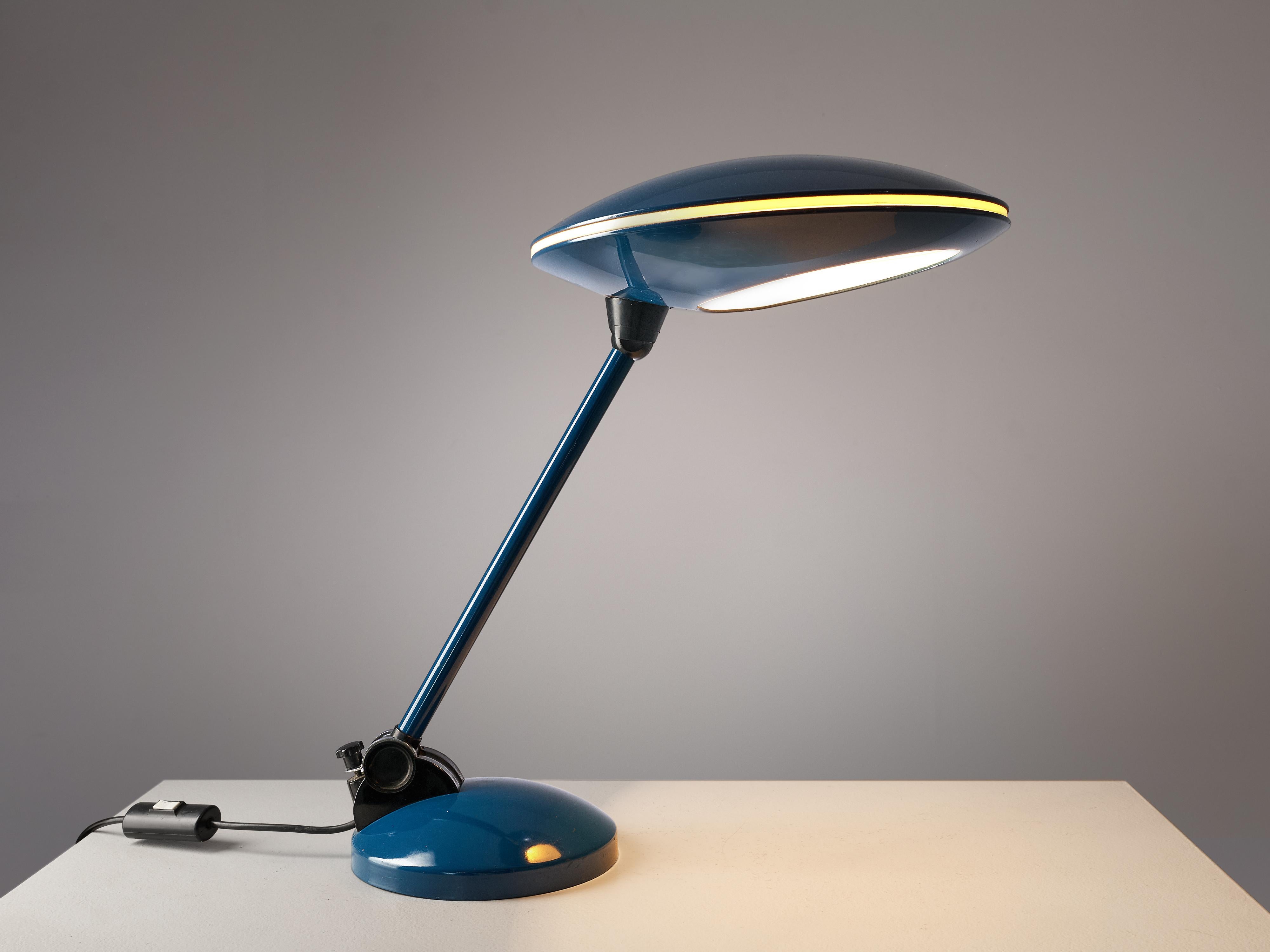 Table lamp, metal, plastic, Italy, 1970s

This lamp is archetypical for post-war Italian design. The table lamp consists table lamp consists out of wide round shade which reminiscent of a ufo. This look is mainly achieved by the light partition