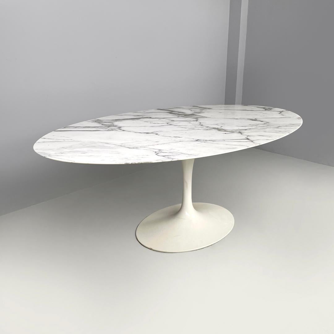 Italian postmodern white marble dining table Tulip Eero Saarinen for Knoll, 2015
Dining table model Tulip with oval top in white Calacatta marble with gray streaks. The leg of the table has a round base in white painted metal.
Produced by Knoll in
