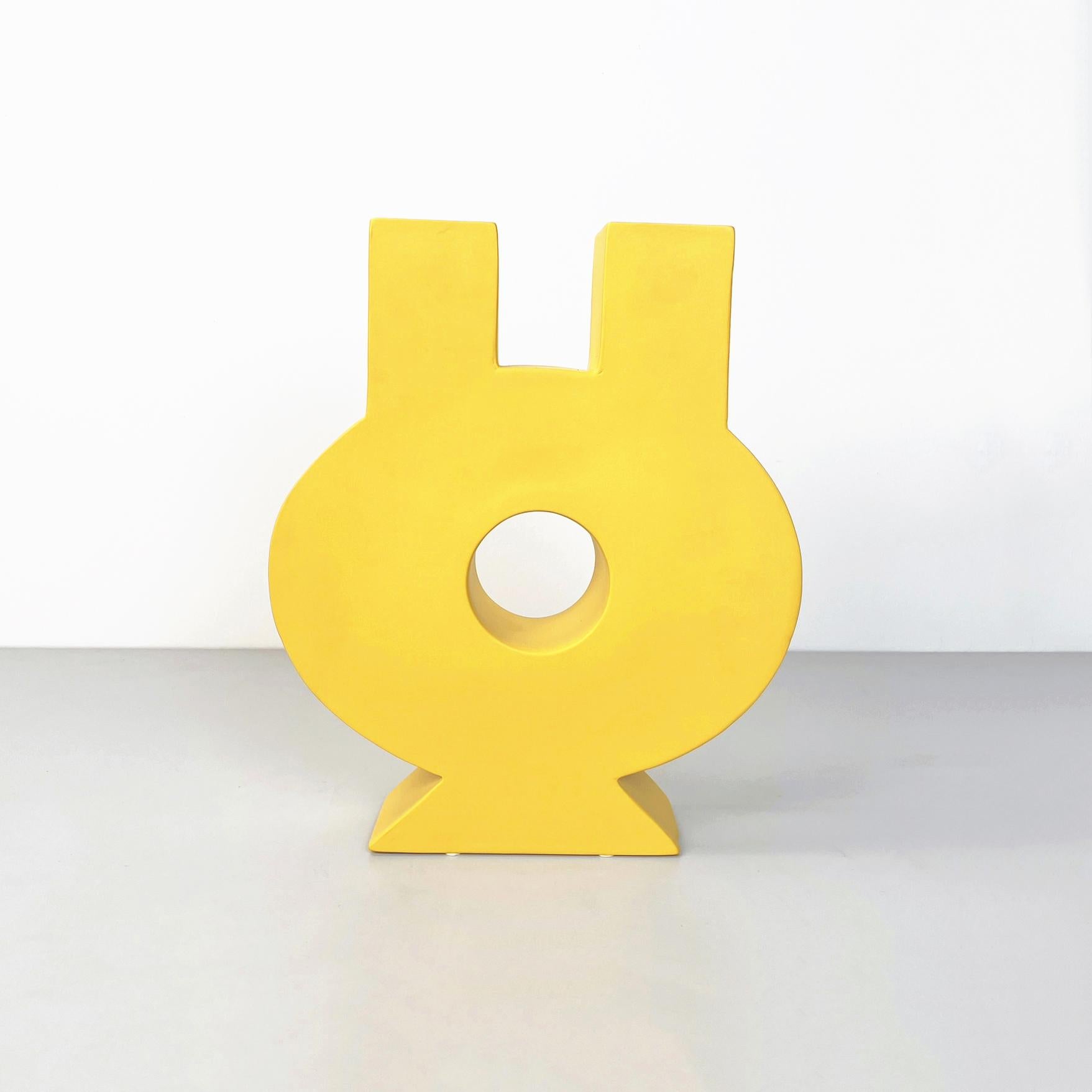 Italian postmodern yellow ceramic sculpture by Florio Pac Paccagnella, 2023
Bright yellow painted ceramic sculpture Polifemo with matte finish. The subject of the sculpture is geometric composed of a circle with holes in the center and two upper