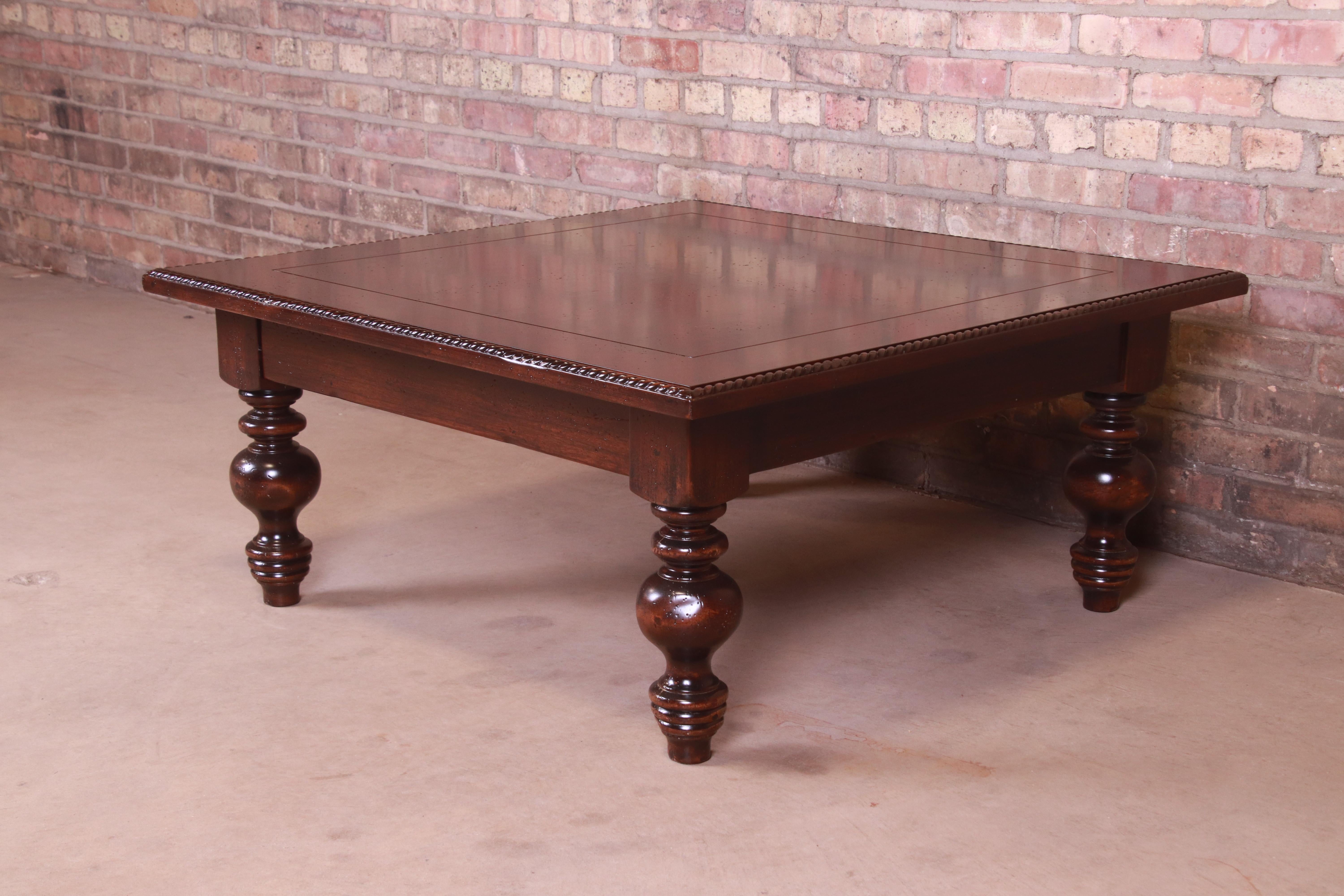 A gorgeous Italian Provincial carved walnut and maple coffee table with turned legs

By Guido Zichele

Retailed by Bloomingdale's, New York

Italy, Late 20th Century

Measures: 39.75