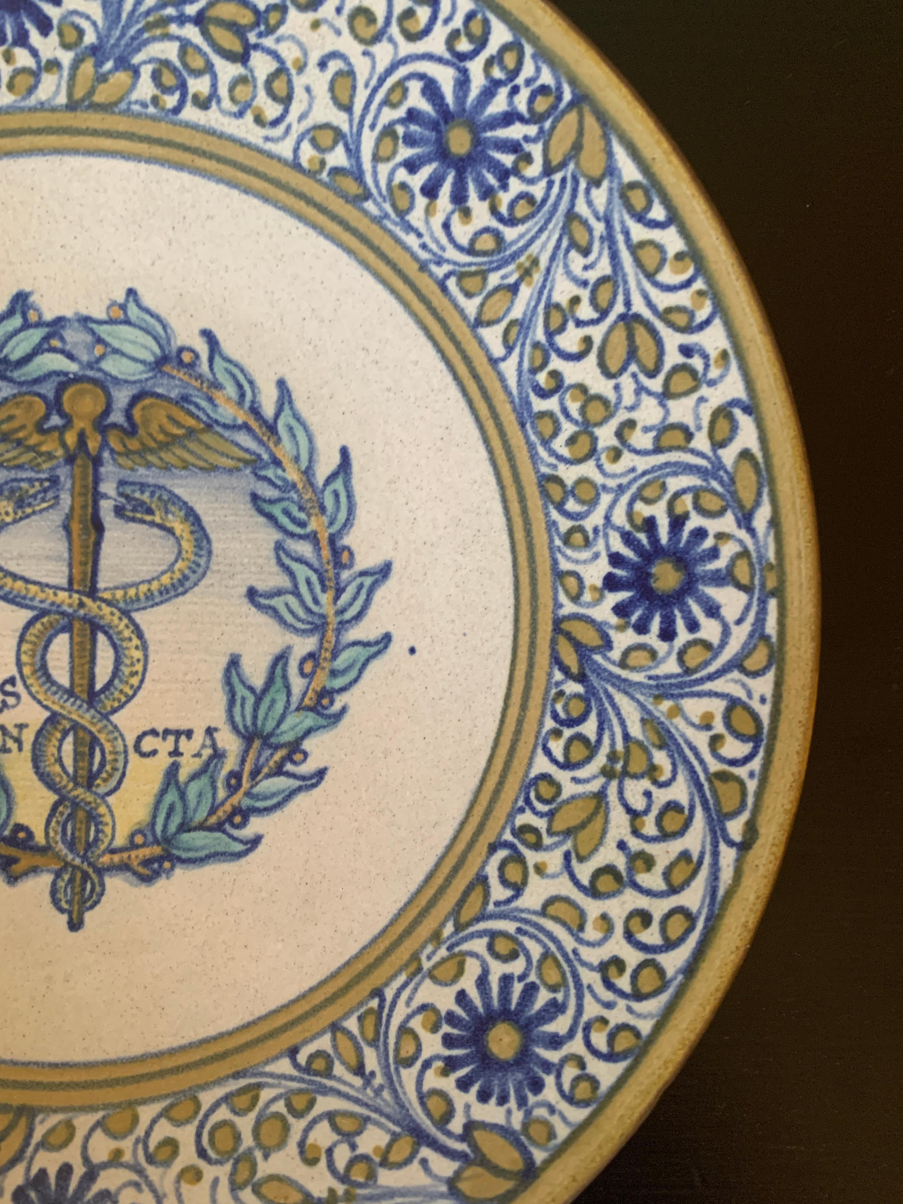 20th Century Italian Provincial Deruta Hand Painted Faience Caduceus Pottery Wall Plate For Sale