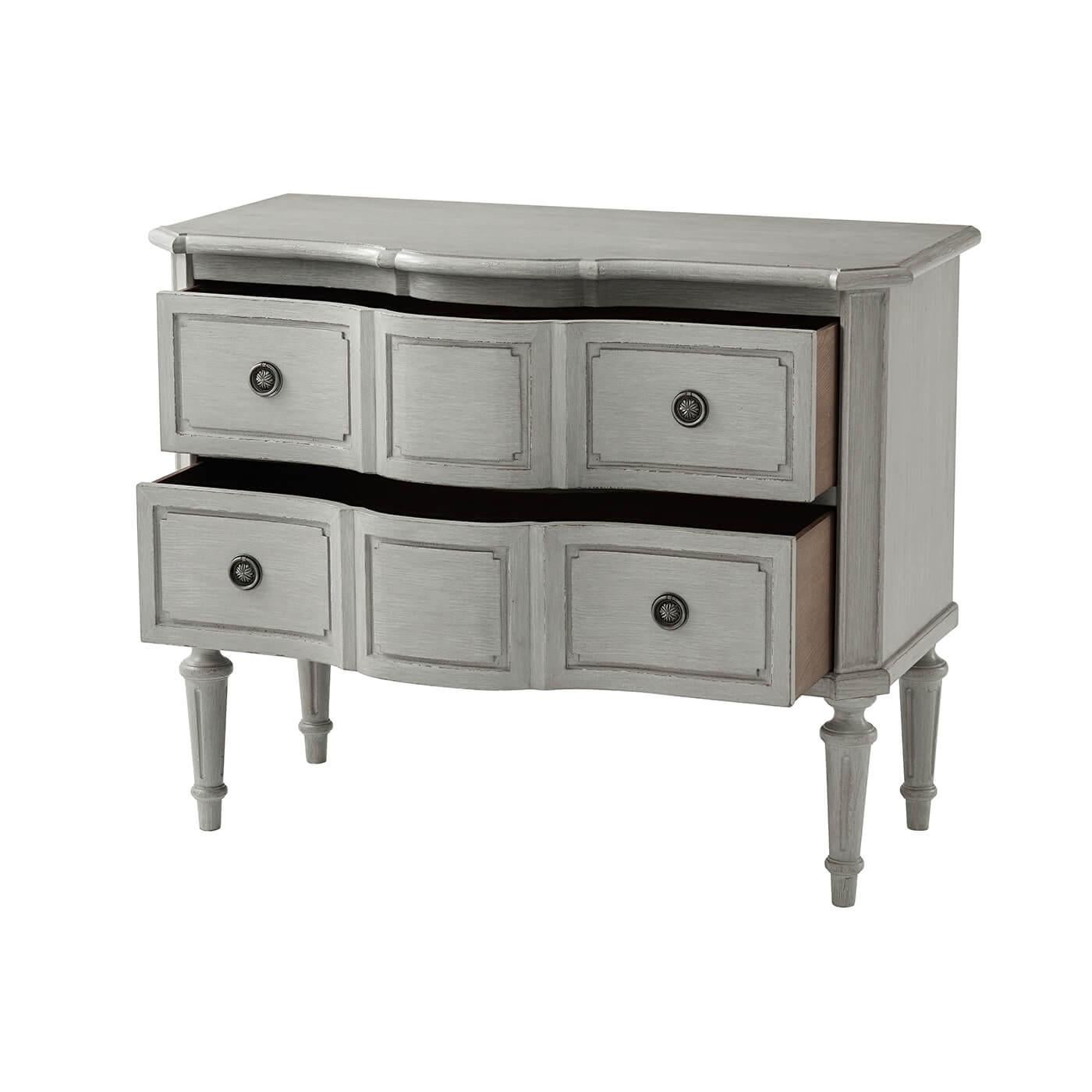 Italian Provincial dresser - Louis XVI style provincial commode with an antiqued hand painted and slightly distressed finish, a serpentine molded edge top above two long paneled drawers, with antiqued pewter finish roundel handles, with canted