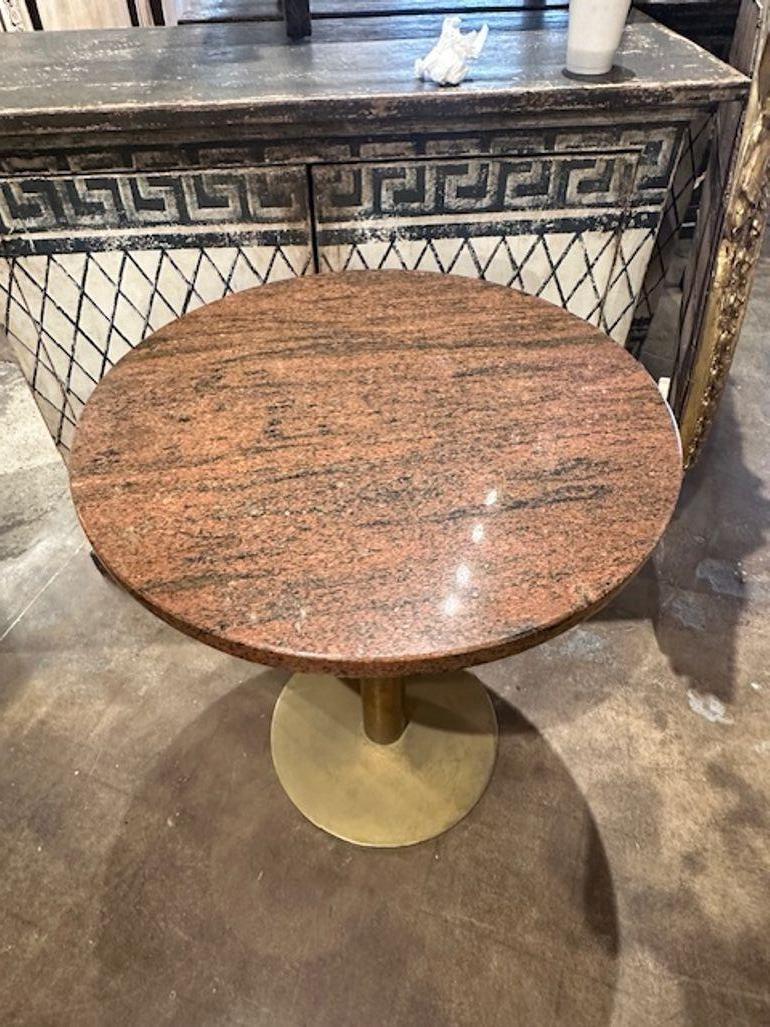 Mid-century Italian heavy bronze and granite top pub table. Circa 1960. These are perfect for an outdoor design, very durable!