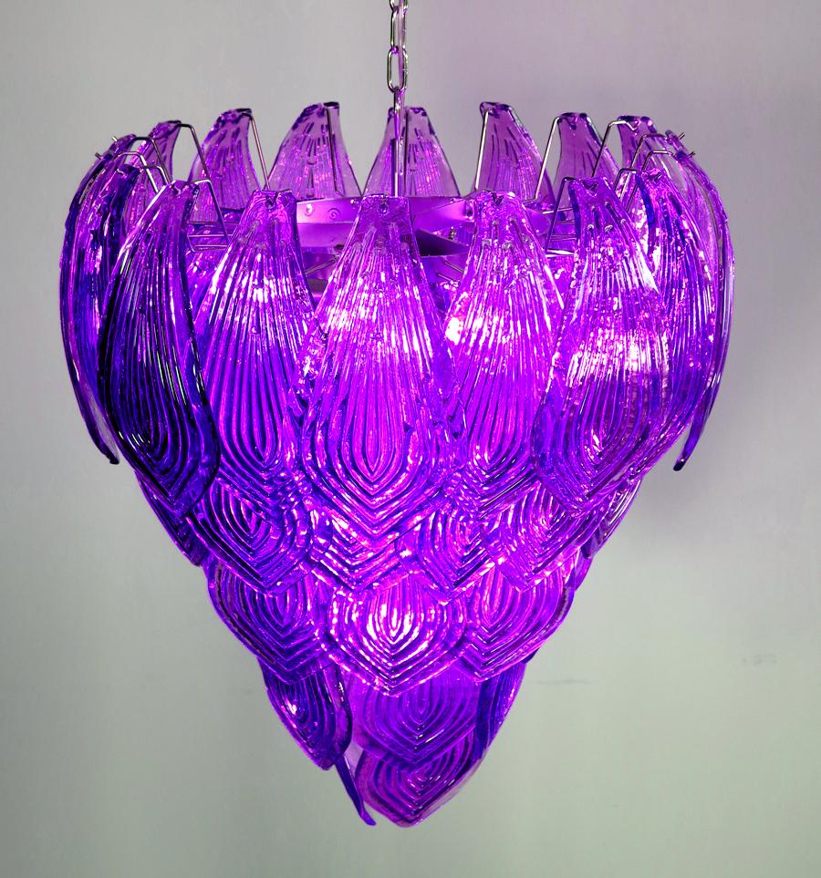 Beautiful and huge Italian Murano chandelier composed of 52 splendid purple glasses that give a very elegant look. The glasses of this chandelier are real works of art, the weight of this chandelier is 50 kg.
Period: late 20th century
Dimensions: