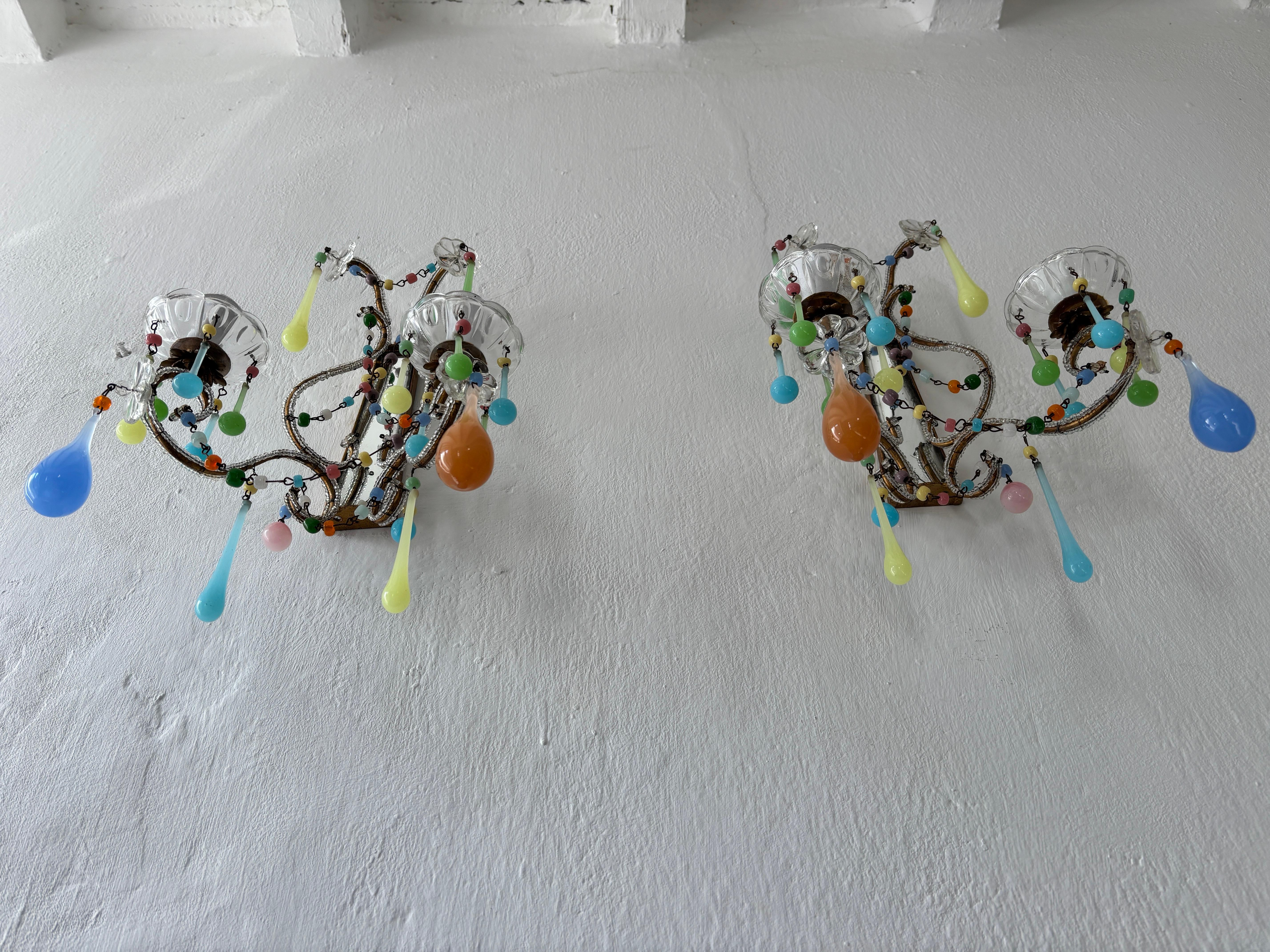 One of a kind!  These were made for a hotel in the South of France.  The owner had all one of a kind lighting, mainly opaline in her hotel of her designs. I will be acquiring more in the near future.  Housing two-light each, sitting in crystal