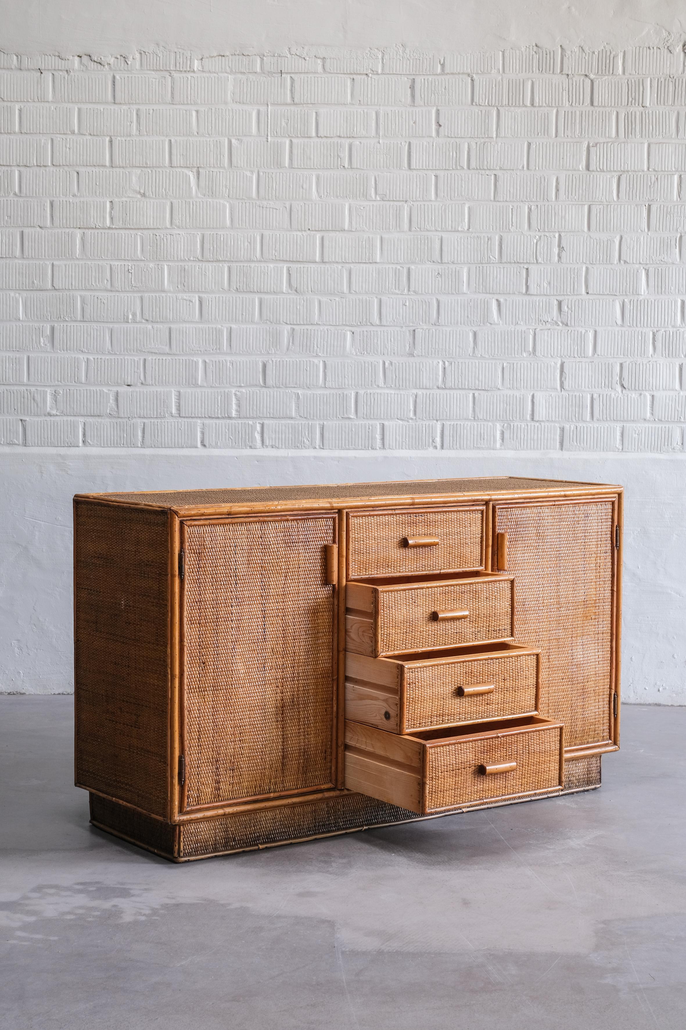 Italian Ratan cabinet from the 70ties with great Patina.