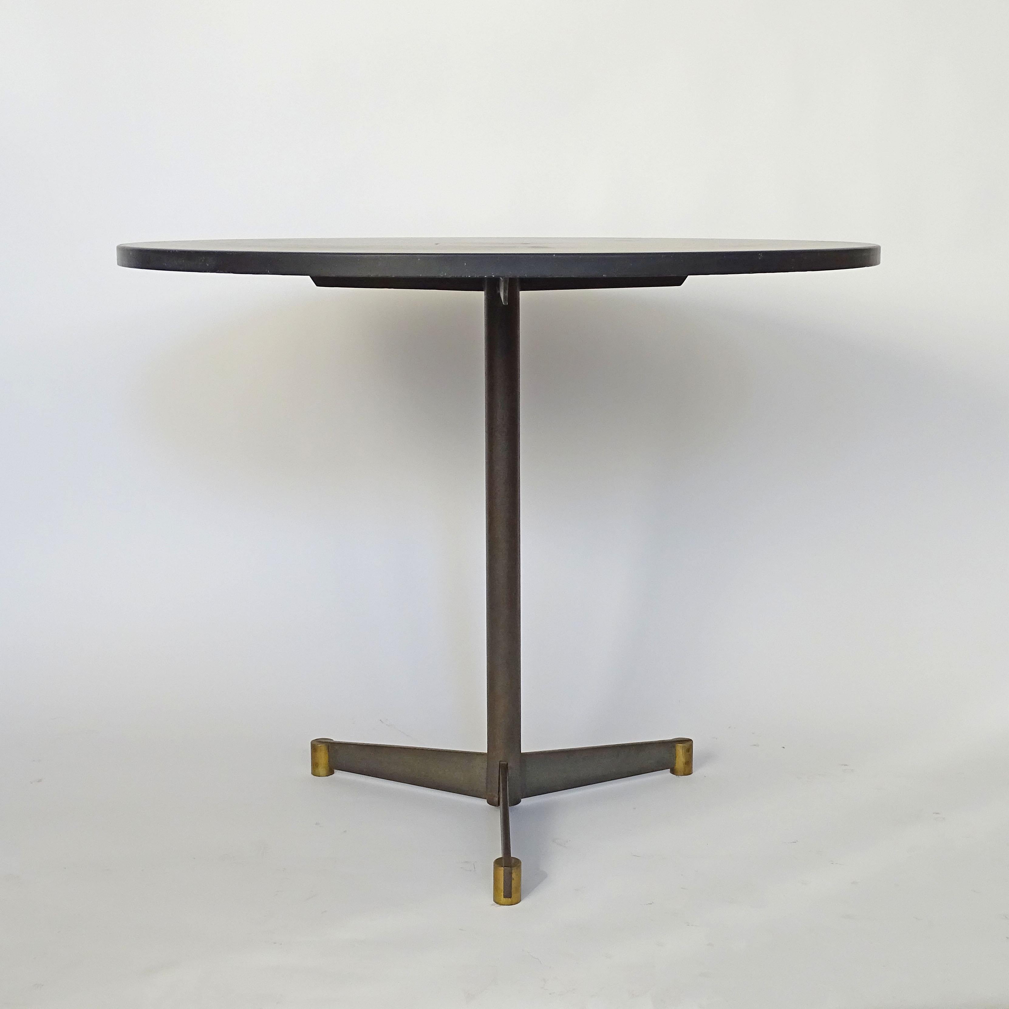 Italian Rationalist round dining table in Brass, Iron, and Slate 