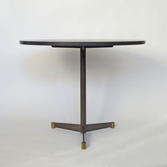 Italian Rationalist round dining table in Brass, Iron and Slate