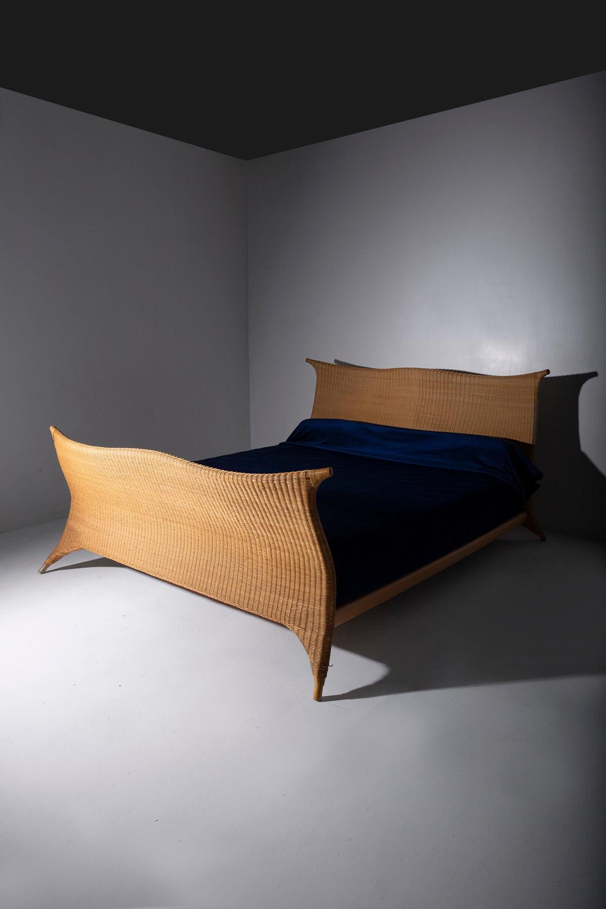 Late 20th Century Italian rattan bed by PierAntonio Bonacina, with label