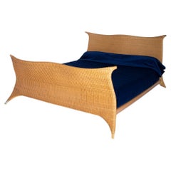 Used Italian rattan bed by PierAntonio Bonacina, with label