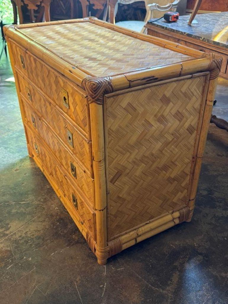 Vintage Italian rattan parquetry design 4-drawer chest with brass pulls. This chest offers a warm, coastal-modern aesthetic with a touch of mid-century flair. Circa 1960. 36.5w x 19d x 29h