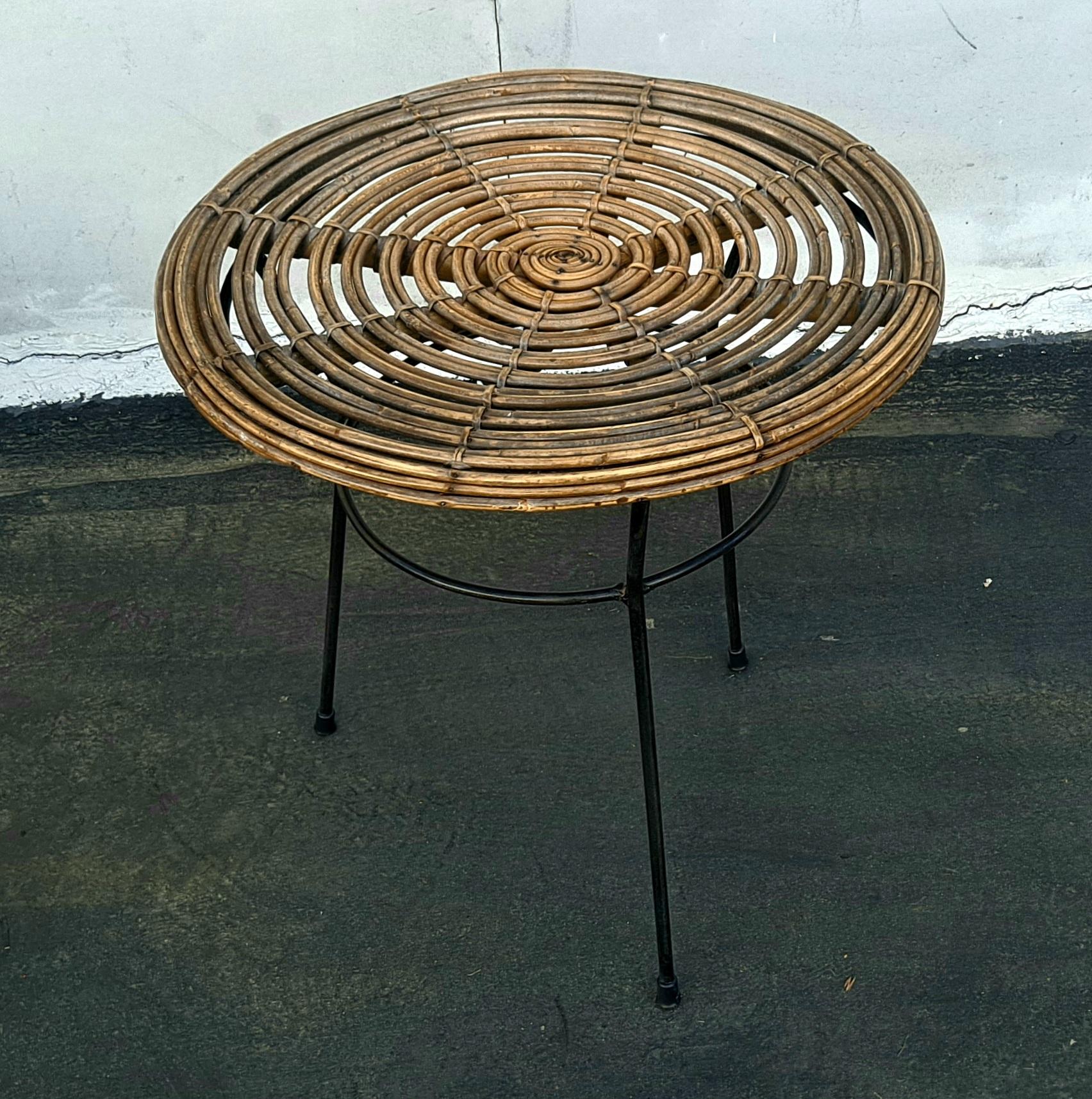 Mid century Rattan side table attributed to Franco Albini.
     