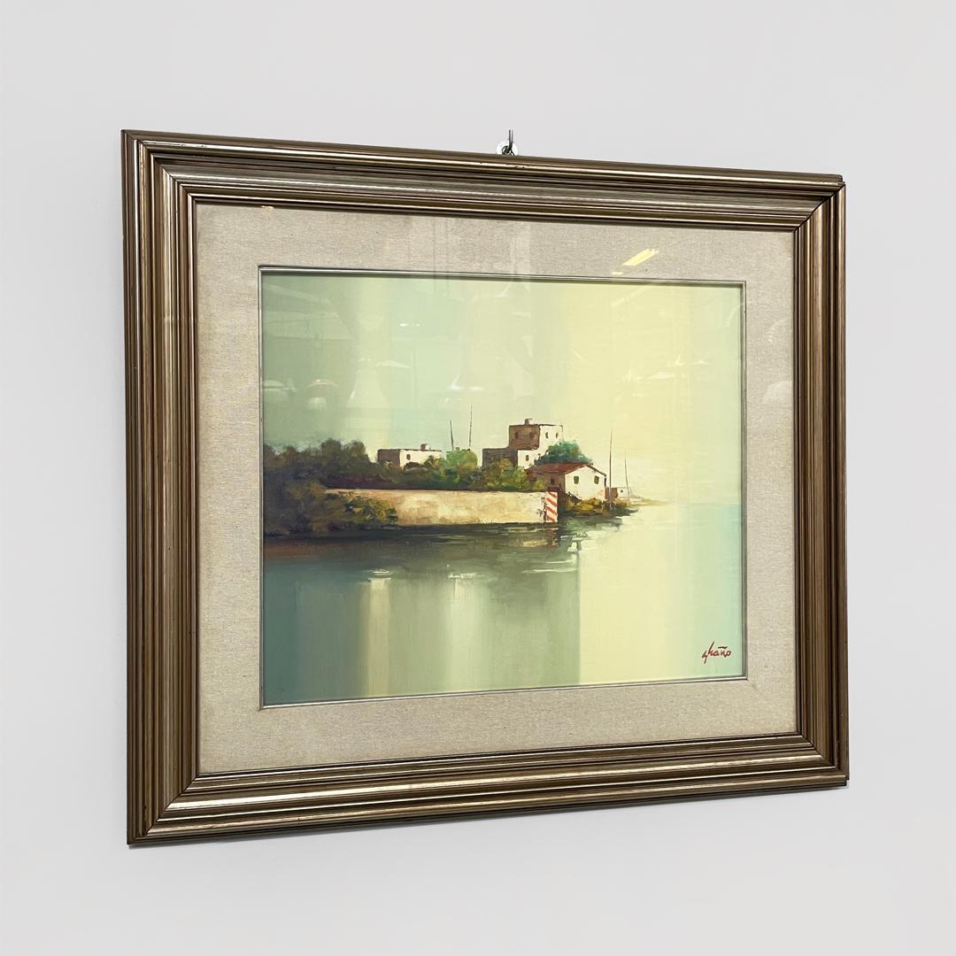 Italian rectangular oil painting with wooden frame of a landscape, 1970s
Oil painting with rectangular gold-colored wooden frame and fabric passe-partout.
The painting represents a landscape with four houses in the foreground. The warm colors are