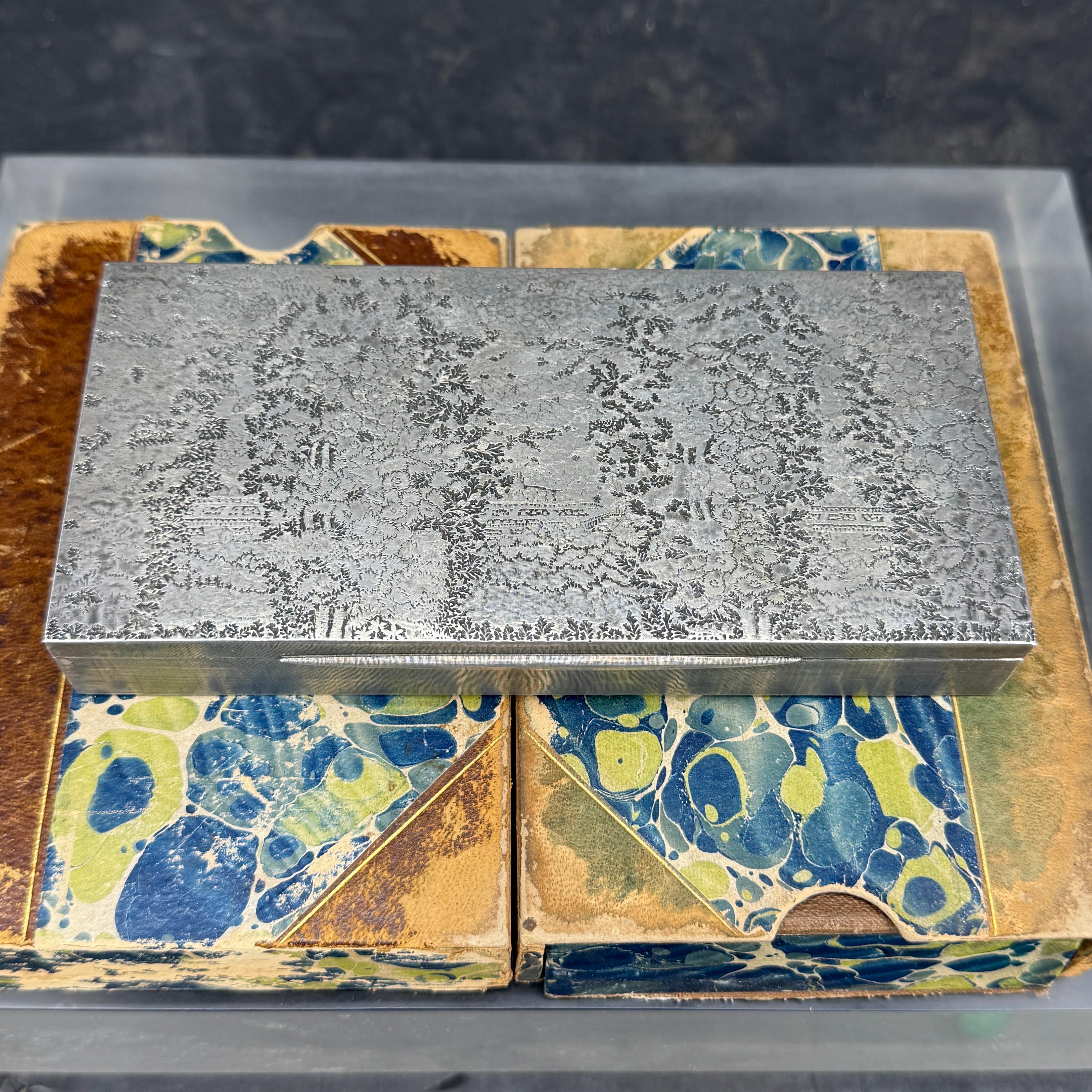 This impressive Italian sterling box would work as a jewelry box, cigarette box as well as a trinket box.
Signed Buccellati.
