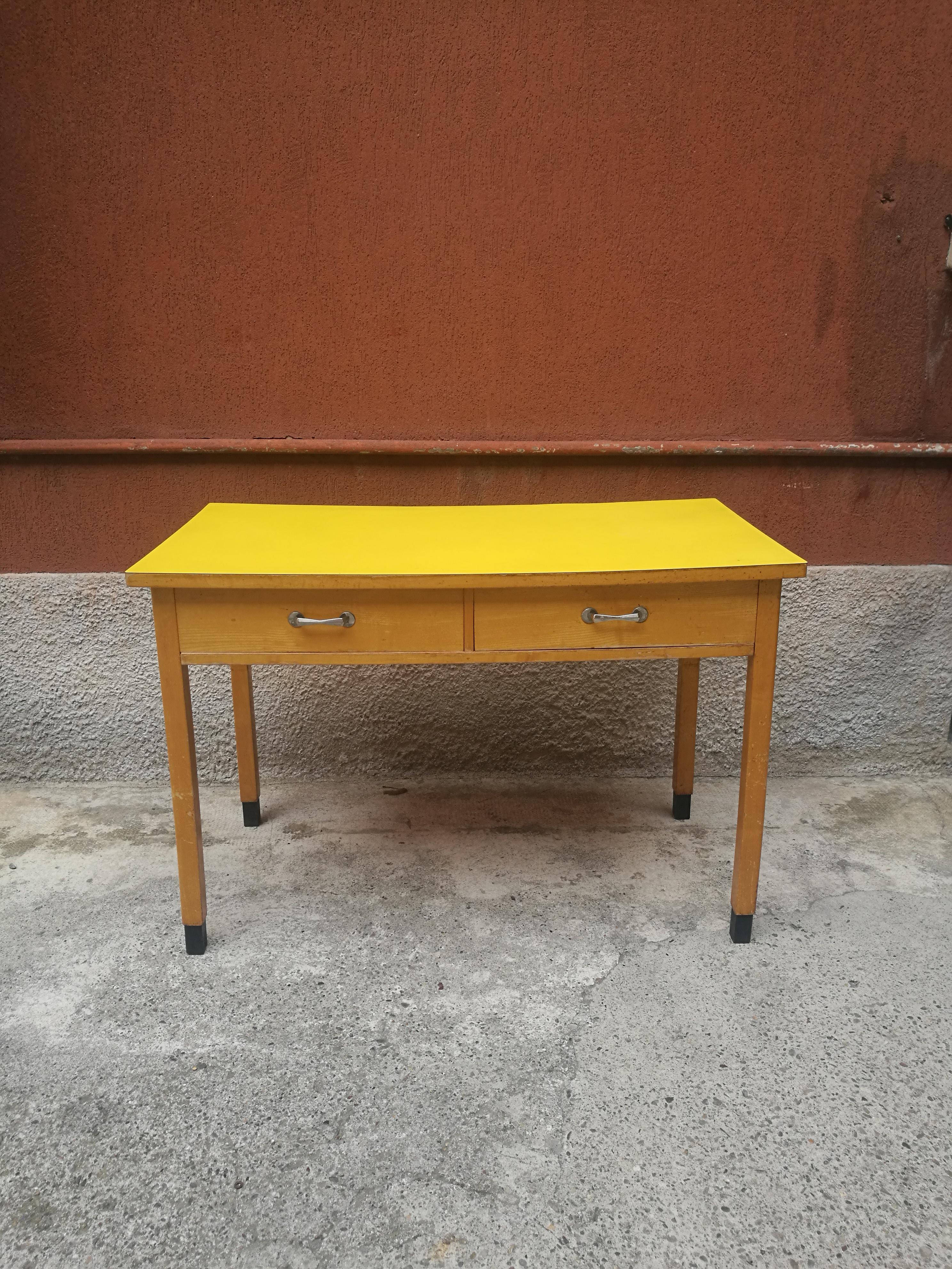Italian rectangular yellow table with two drawers and chromed handles, 1960
Typical midcentury Italian table, used in kitchen of that time, so surely of rare dimension comparing with standard size of modern products. Its composed by a rectangular