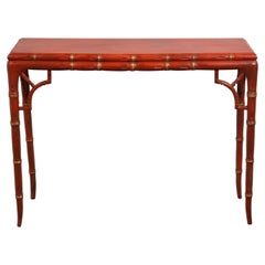 Console italienne en faux bambou rouge et or avec écoinçons en arc de cercle