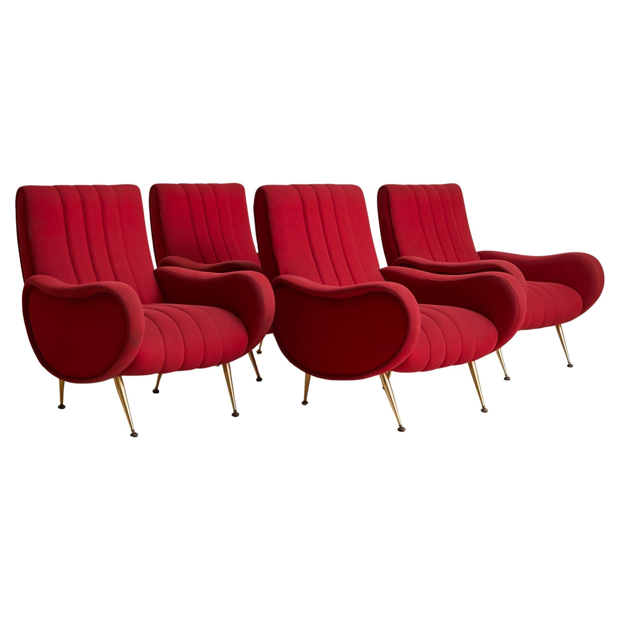 Sold and priced individually.

A sculptural 1950s Italian armchair defined by voluptuous curves and channeled upholstery. The silhouette nods to Marco Zanuso’s iconic ‘Lady’ chair—plush, low-slung, and confidently modern.

Its exaggerated arms sweep