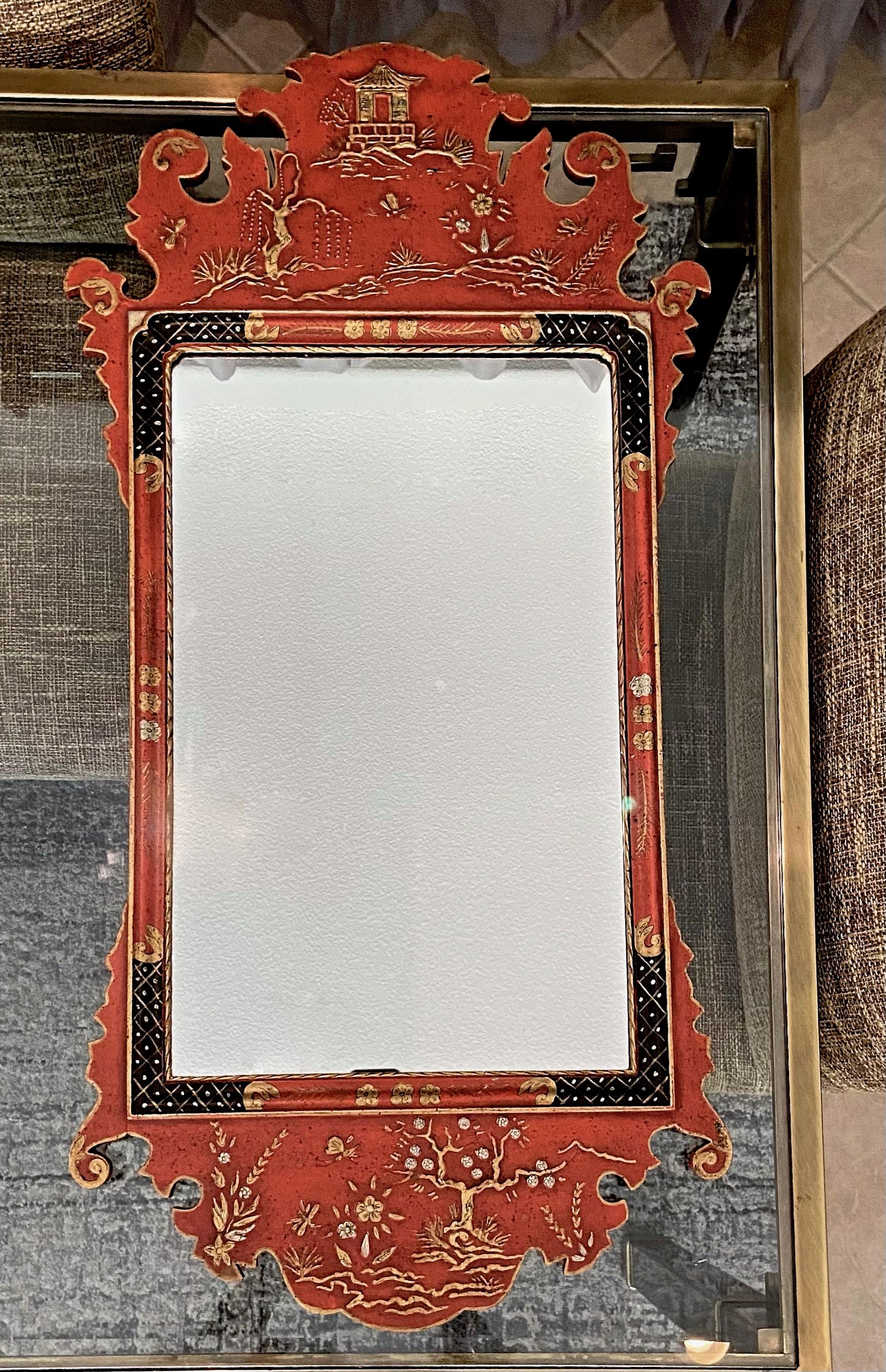 Red Chinese chippendale style wall mirror by Palladio of Italy. Wood frame hand painted. Label on back 