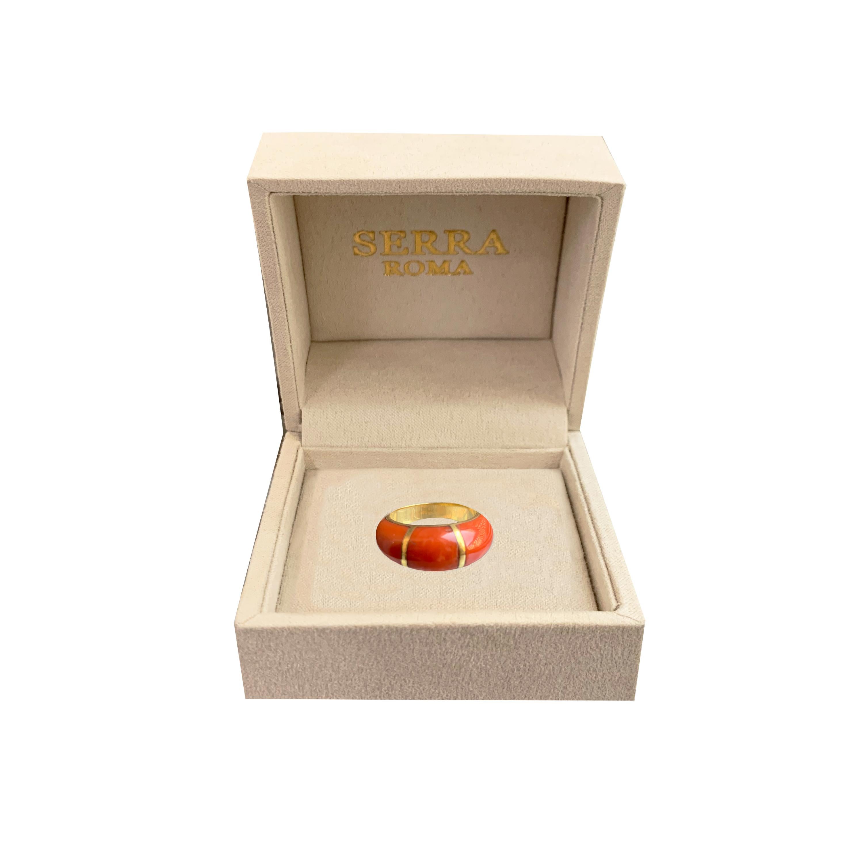 This Italian red coral 18 Kt gold bands ring has a classic but very current design. It was handmade by skilled Italian craftsmen.
Finger size : 5. 3/4 
Weigth : 8.20 gr