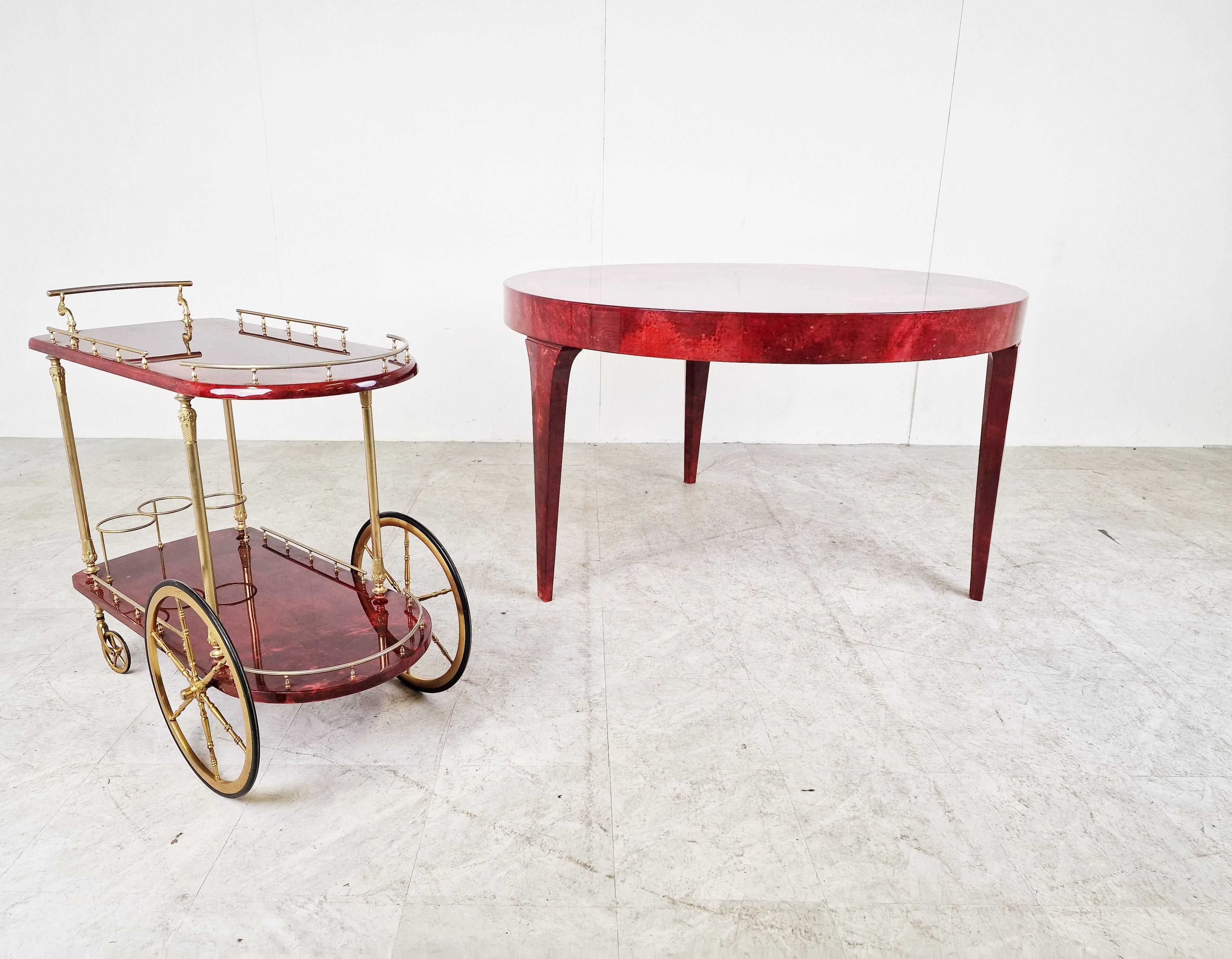 Very rare Aldo Tura goatskin or parchment dining table. 

The striking red colour is a real eye catcher 

Dining tables from Aldo Tura are very rare to find.

Good condition, with normal age related wear

1960s - Italy

Dimensions:
Height: