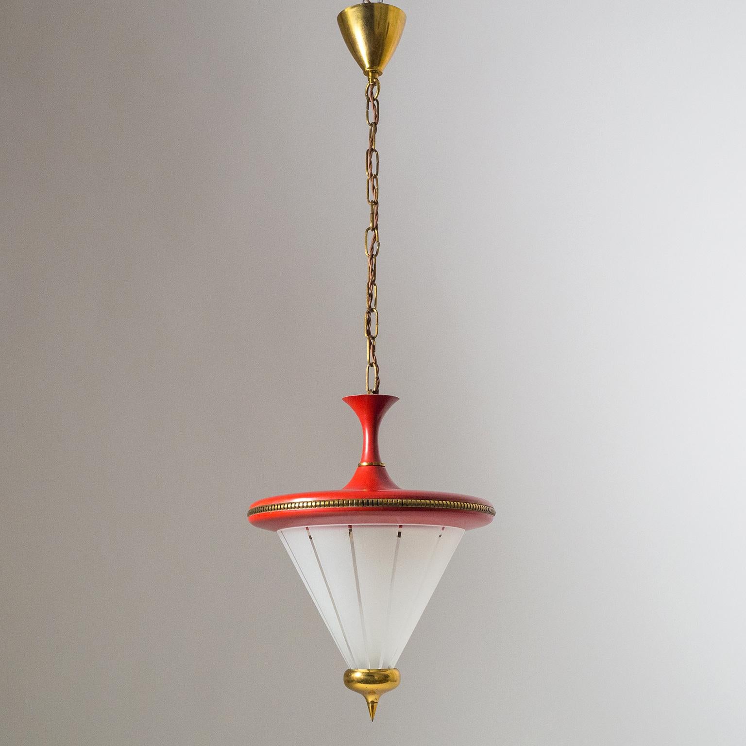 Lovely midcentury Italian lantern. A red lacquered body with intricate brass details and a conical satin striped glass diffuser. Very nice original condition with minor patina. Three original brass E14 sockets with new wiring. Height without the