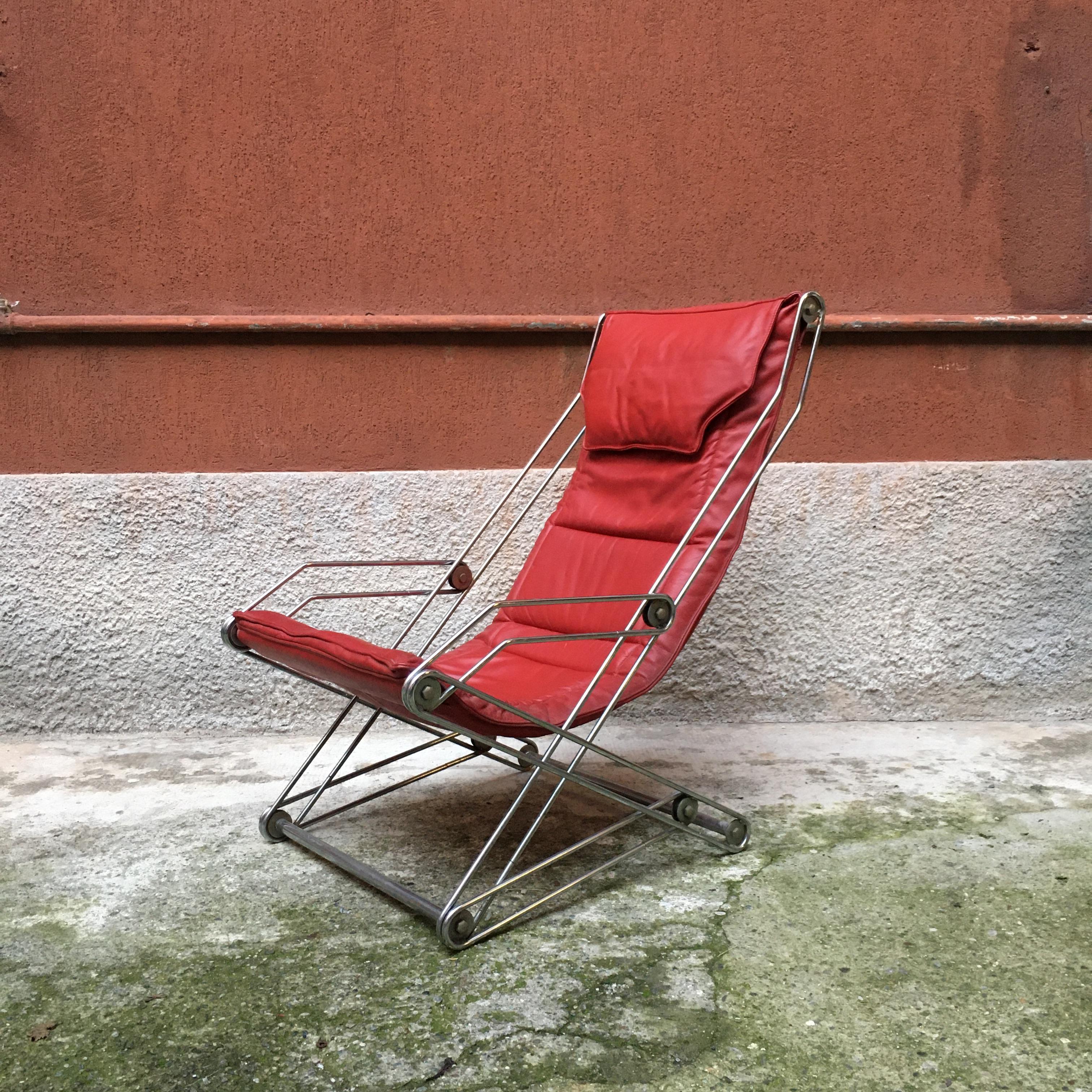 Italian red and chromed steel red armchair, 1970s
Red folding armchair with chromed steel rod structure with adjustable extension
and with original cushion in red sky
Good conditions.