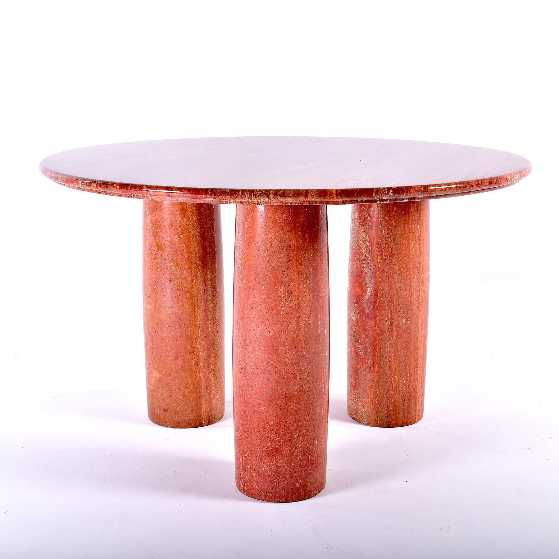 Round dining table on three legs, in massive red Persian travertine.
Designed by Mario Bellini for Cassina, Italy, in 1977.
Designer's concept: 