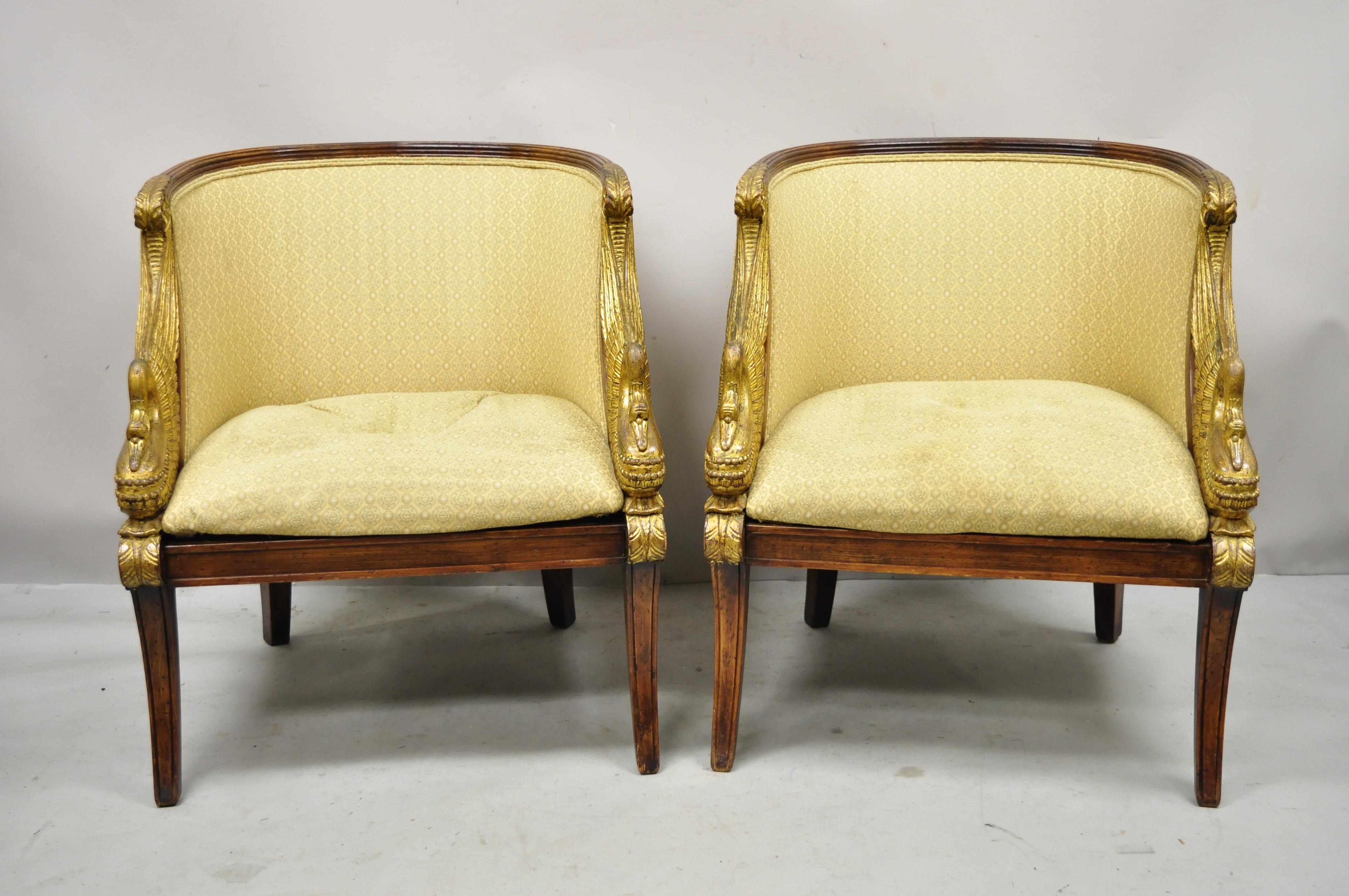 Italian Regency Style carved gold gilt wood swans barrel back club chair - a pair. Item features gold gilt carved wood swans, saber legs, barrel backs, solid wood frames, distressed finish, nicely carved details, quality craftsmanship, great style