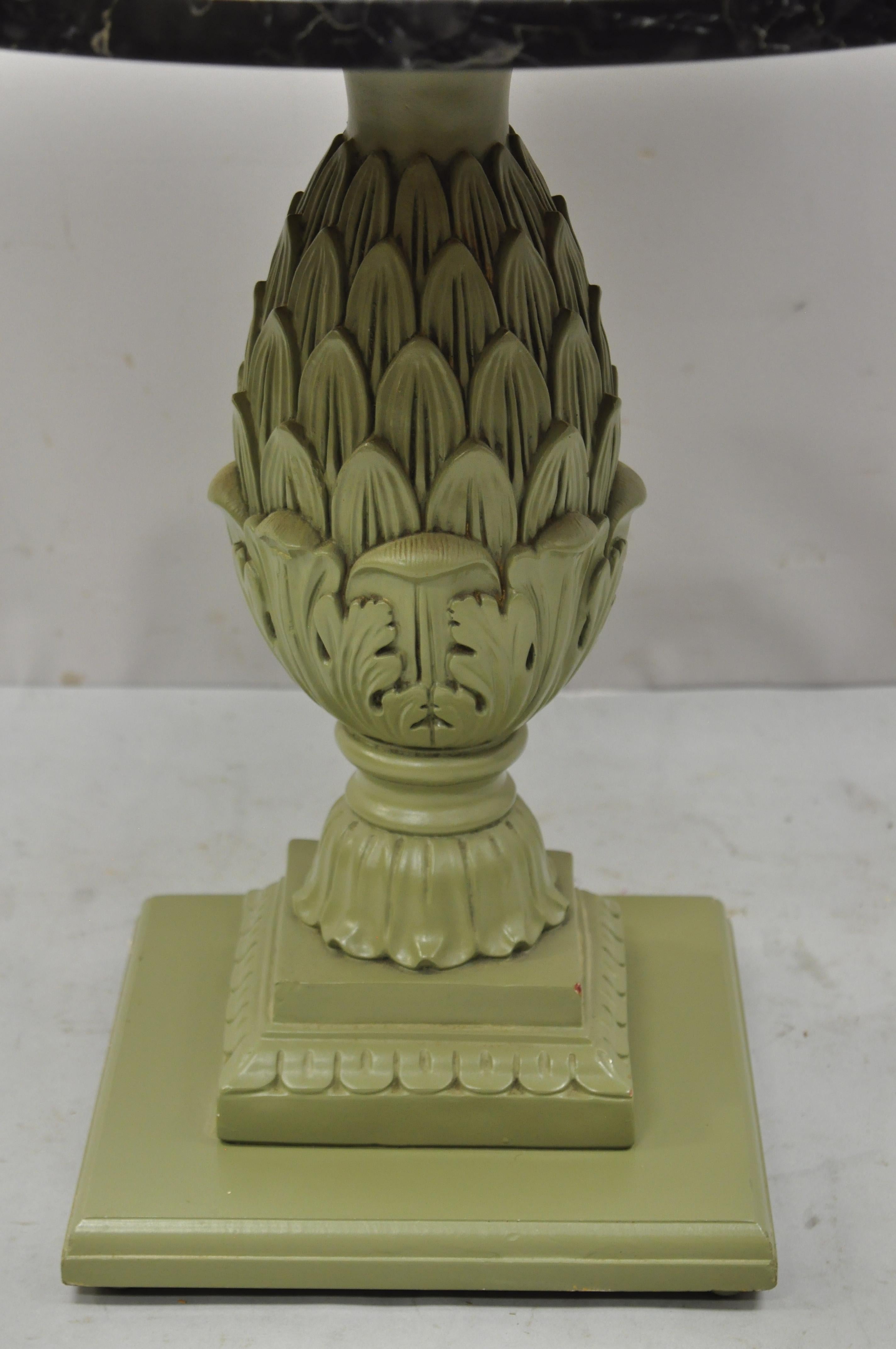 Italian Hollywood Regency green pineapple pedestal base round marble top accent side table. Item features round black marble top, solid carved wood artichoke/pineapple pedestal base with green painted finish, very nice vintage item, great style and
