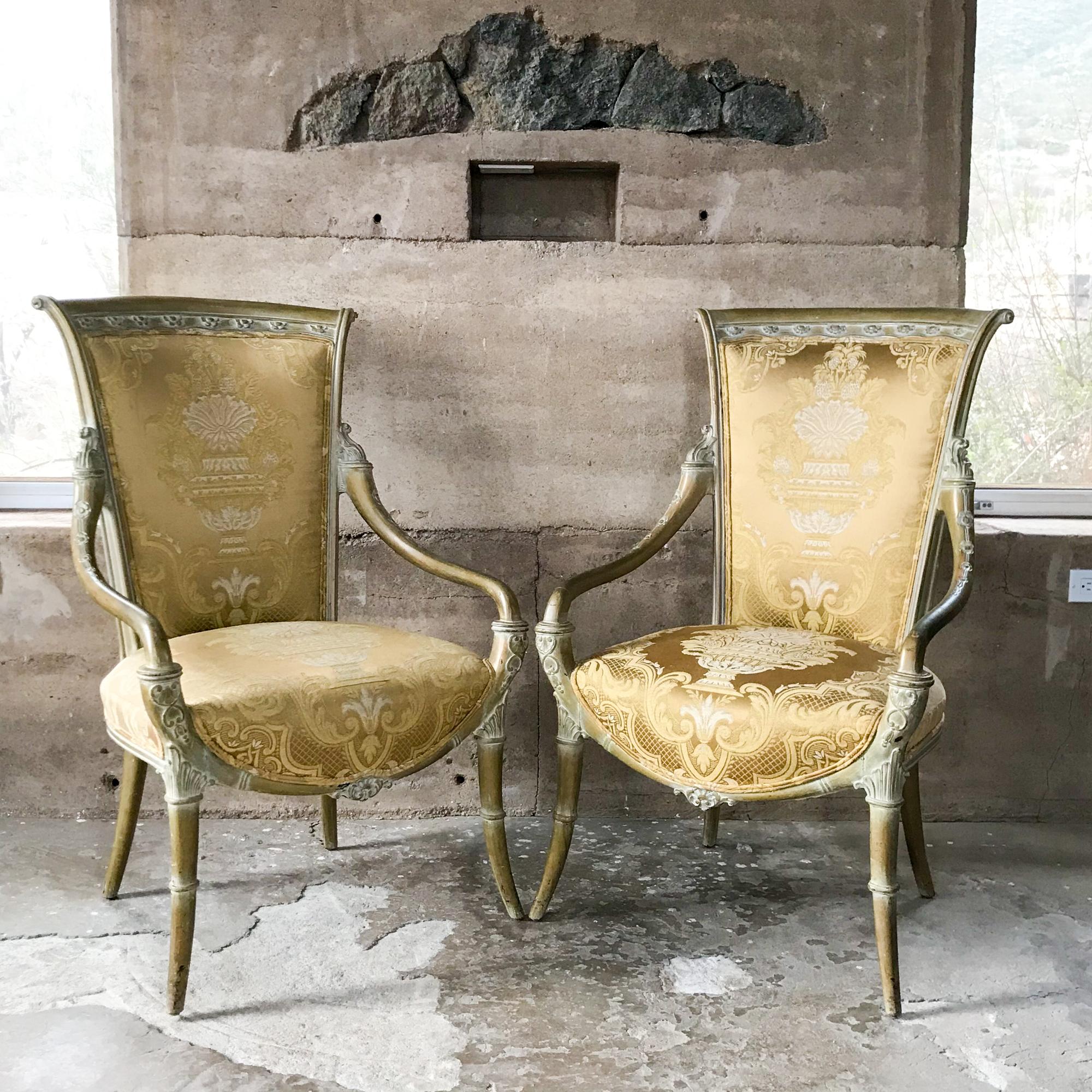 Armchairs
Pair of Italian Regency Armchairs, Louis XV period.
Hand carved Mahogany Wood with Original Gold Leaf Whitewash Finish. 
Curvy elegant lines. Exquisite detail. These are fabulous. In the style of Maison Jansen.
Spring Cushion System. Silk