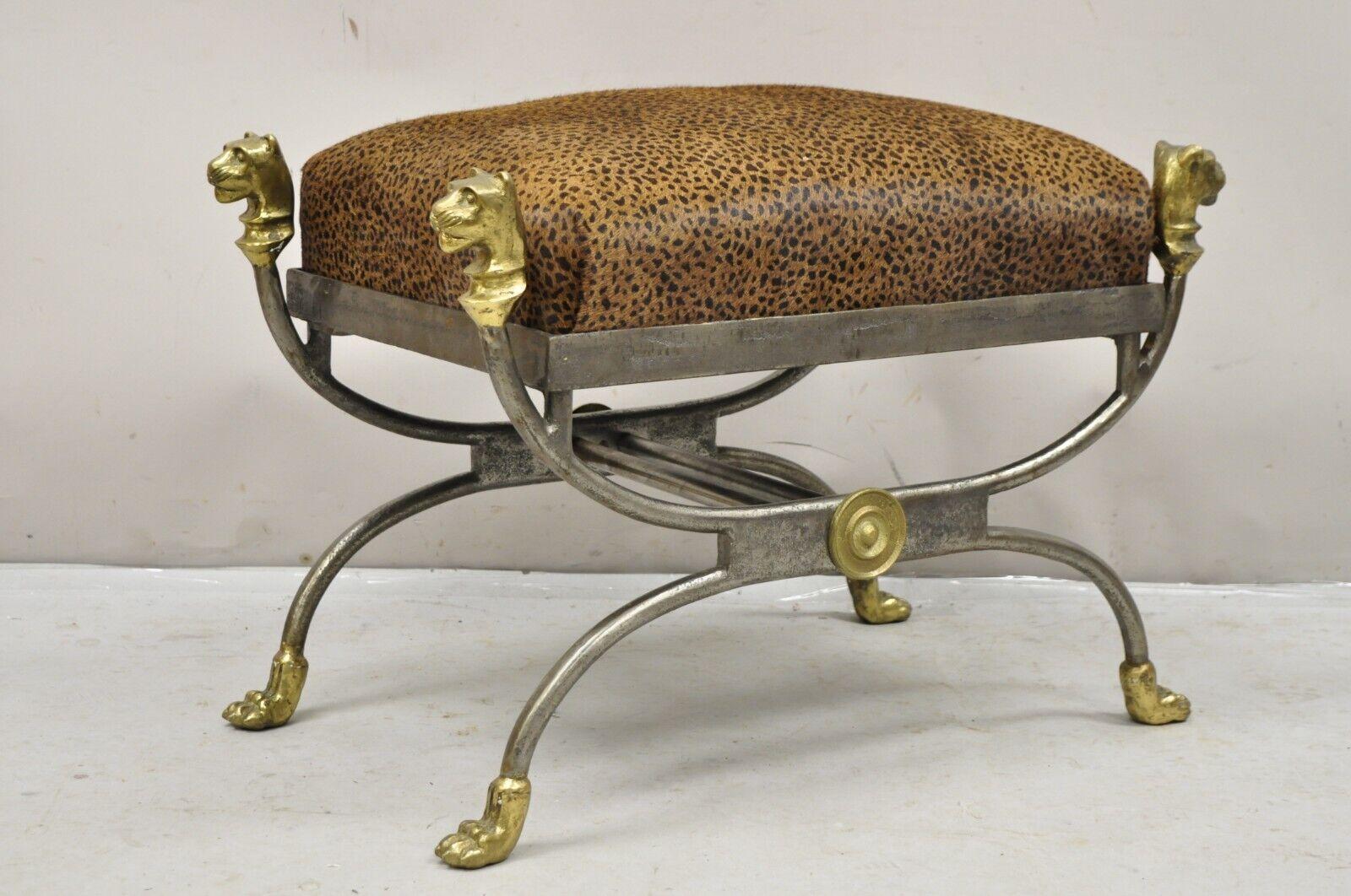 Italian Regency Neoclassical Style Bronze Lion Head Paw Feet Steel Curule Bench . Item features a cowhide leopard print cushion with interior springs, heavy steel metal frame with bronze lion heads and paw feet, original distressed finish, quality