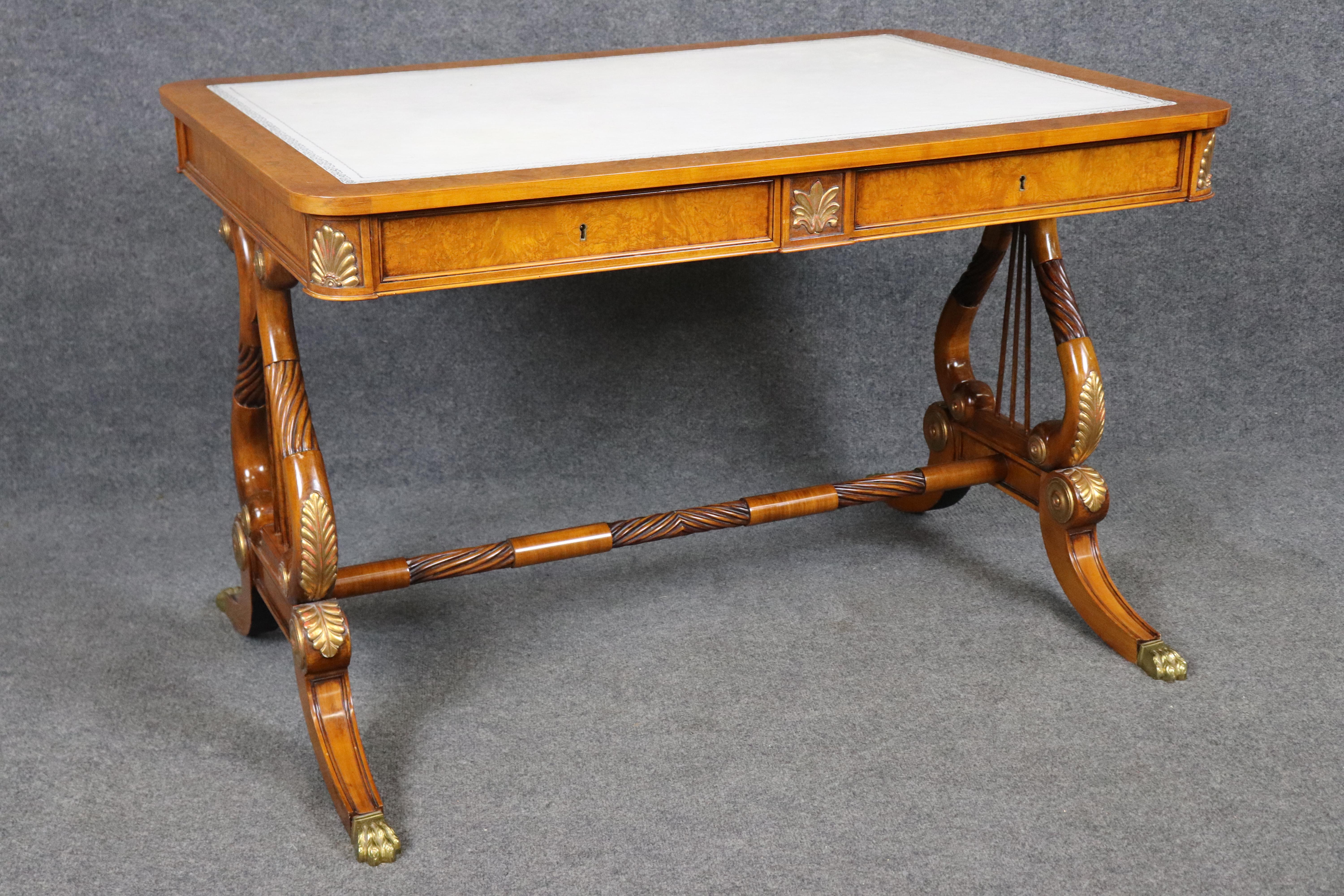 Dimensions - H: 29 1/4 in W: 45 in D: 31 1/2 in 

This stunning Custom Italian Regency Style desk offers an exceptional blend of timeless elegance and contemporary sophistication, ideal for any refined home office, library, or study. The standout