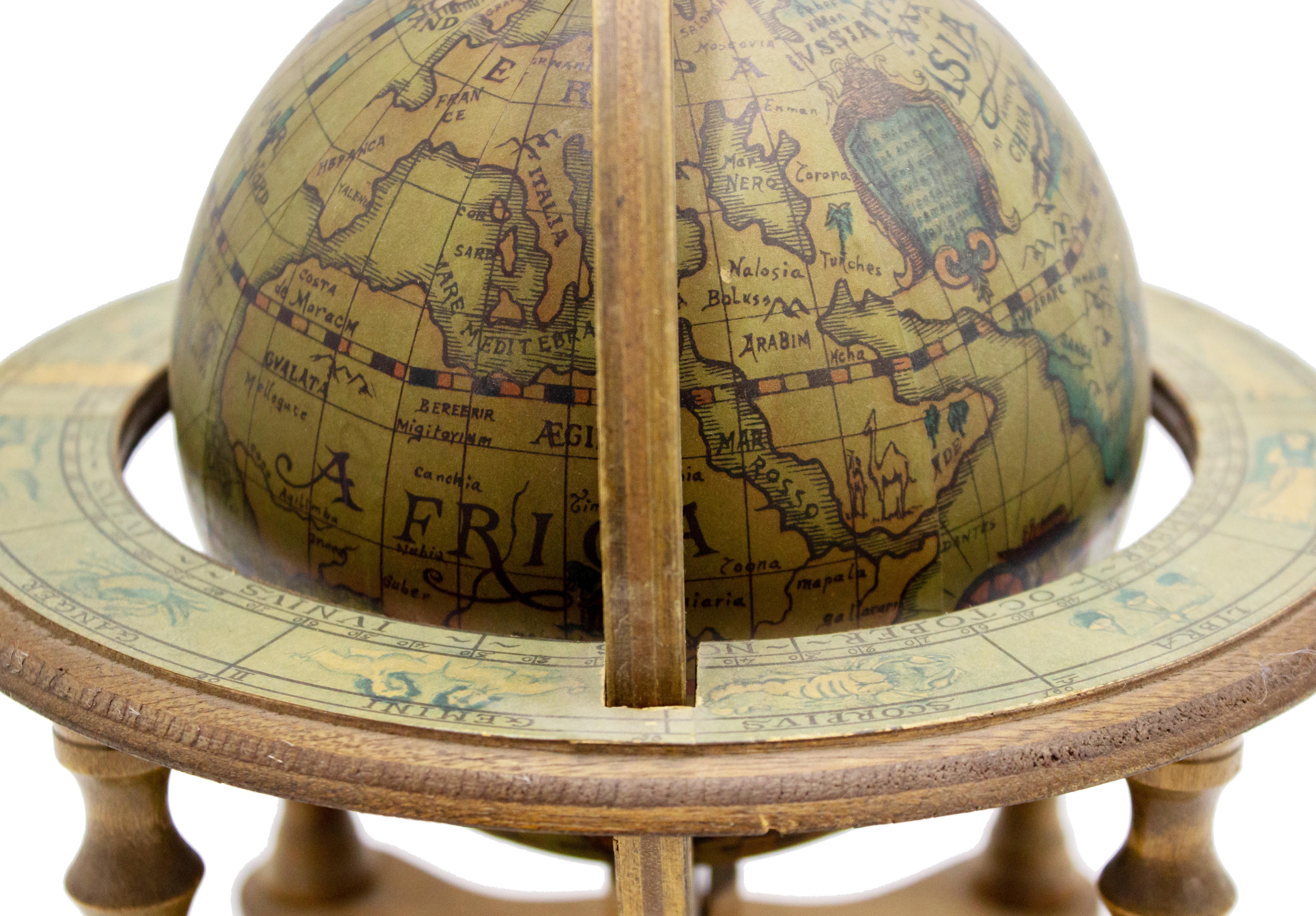 2 Italian Renaissance-style small globe2 on wood decorated stand (PRICED EACH).