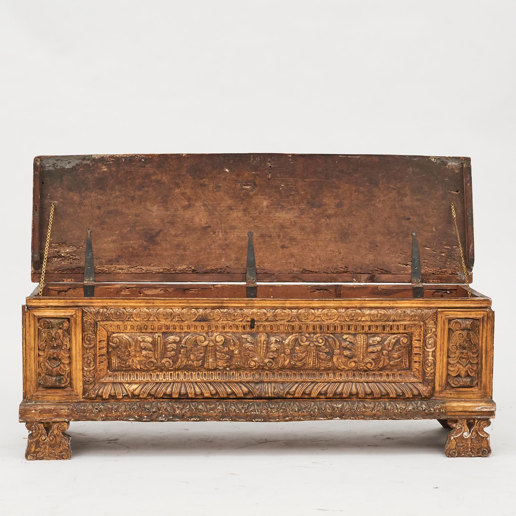 Italian Renaissance cassone / wedding chest, Italy (presumably from Bologna), 1500-1600. It features a gorgeous hand carved front panel with original gildings.
Appears untouched and in original condition.
This wonderful antique cassone will