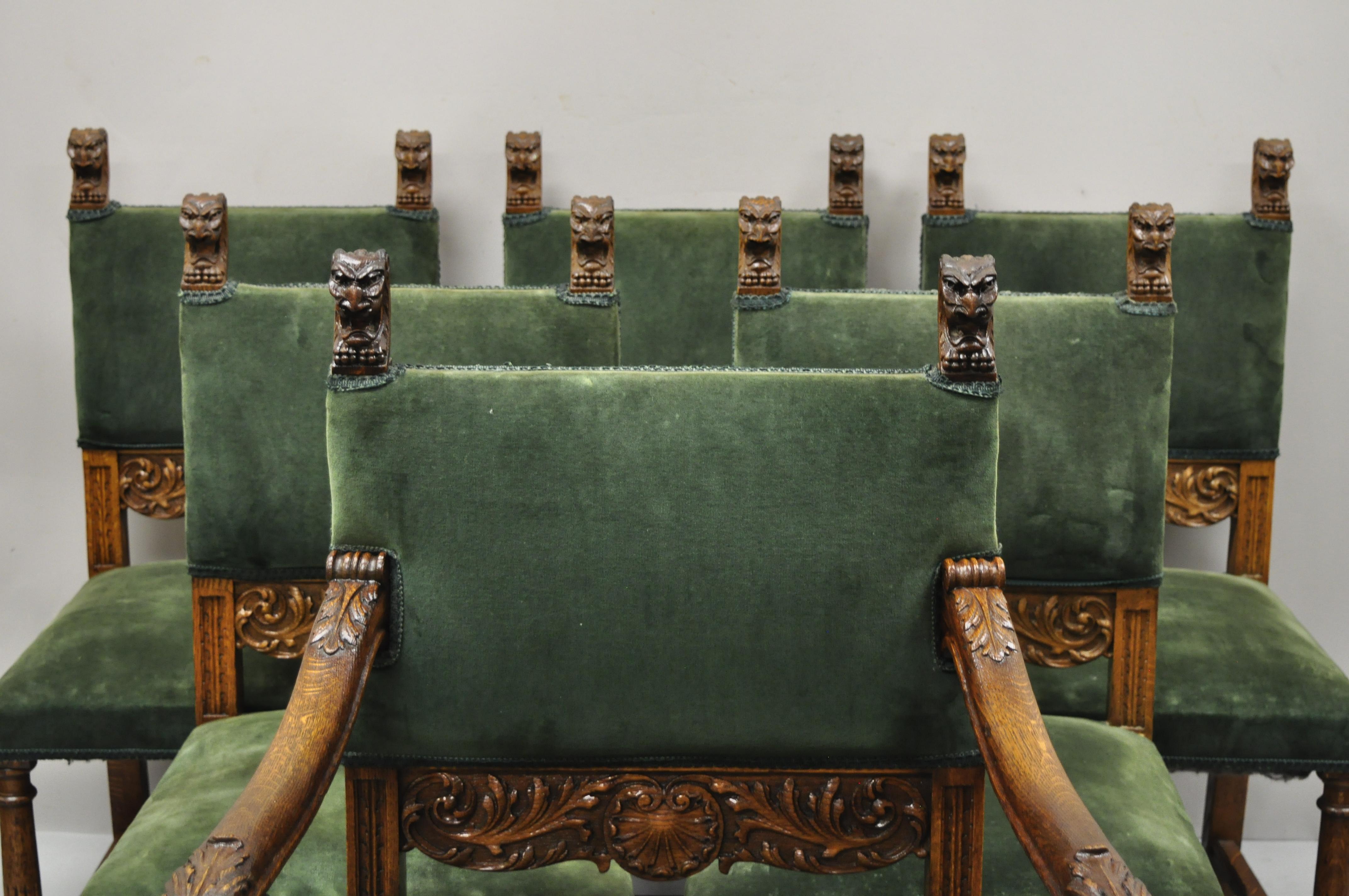 Antique Italian Renaissance lion carved oak wood green mohair dining chairs - set of 6. Set includes (5) side chairs, (1) armchair, green mohair upholstery, lion head carved finials, solid oak wood construction, beautiful wood grain, very nice