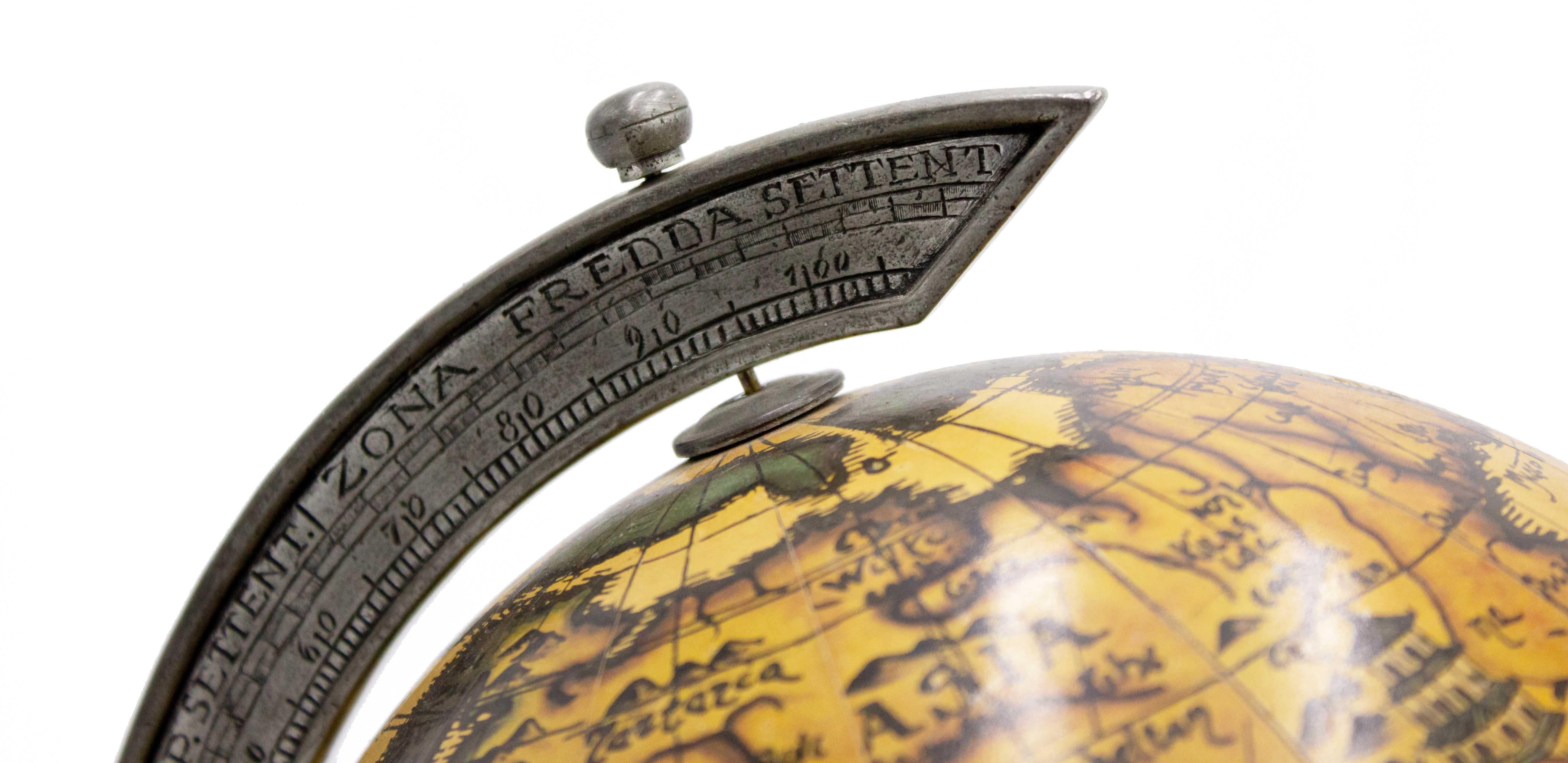 Italian Renaissance-style small metal desk globe on a pewter base and stand