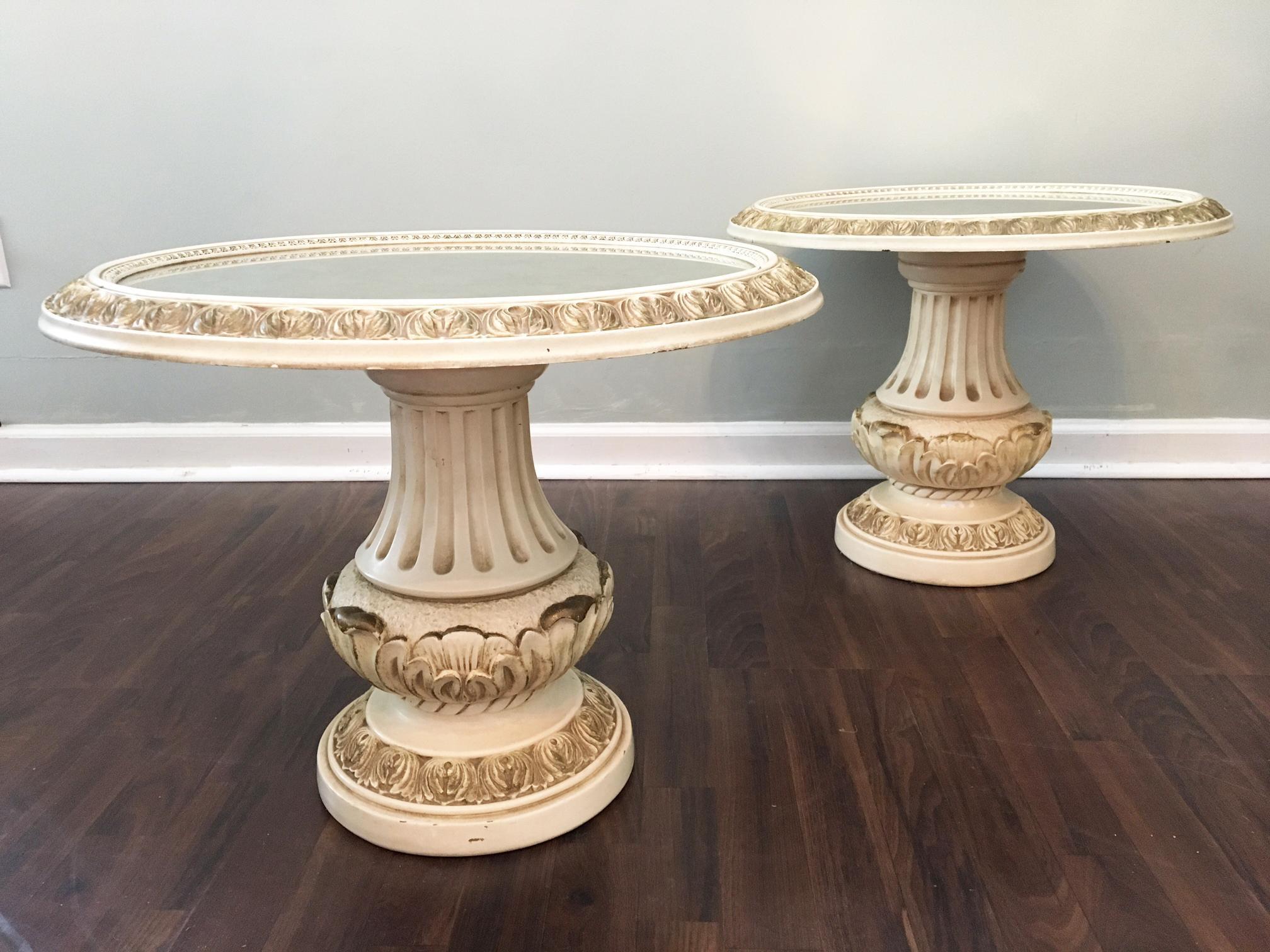 Pair of Italian style column side tables feature marbled glass tops and carved detailing. Perfect for your Hollywood Regency decor. Good vintage condition with chip at base bottom rear.
      
    