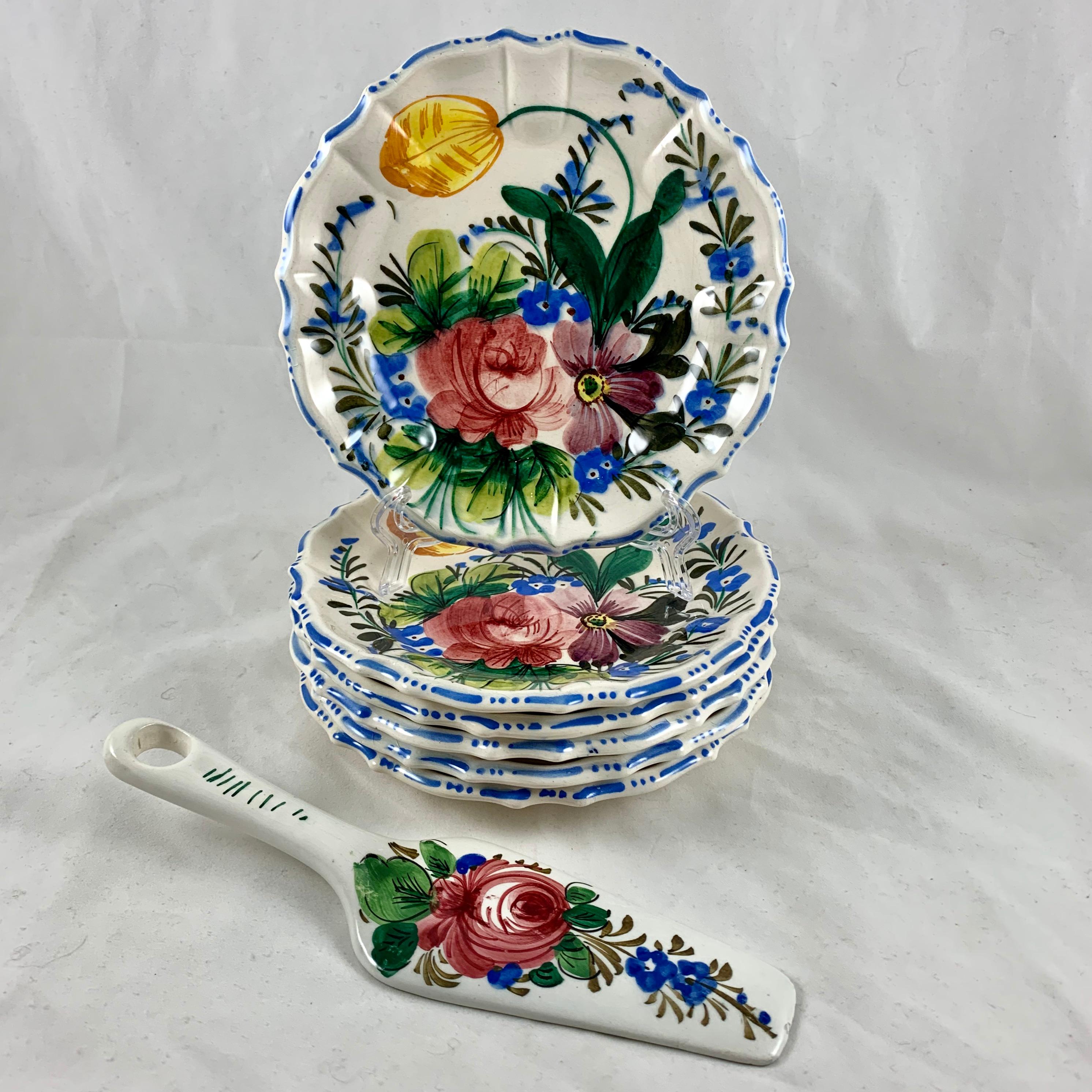 In the Renaissance Revival rose pattern from the Barrettoni già Antonibon pottery in Nove, Italy, a set of six hand painted plates along with a complementary pie slice, circa 1930s.

An overall floral decoration with a bright blue dash and dot