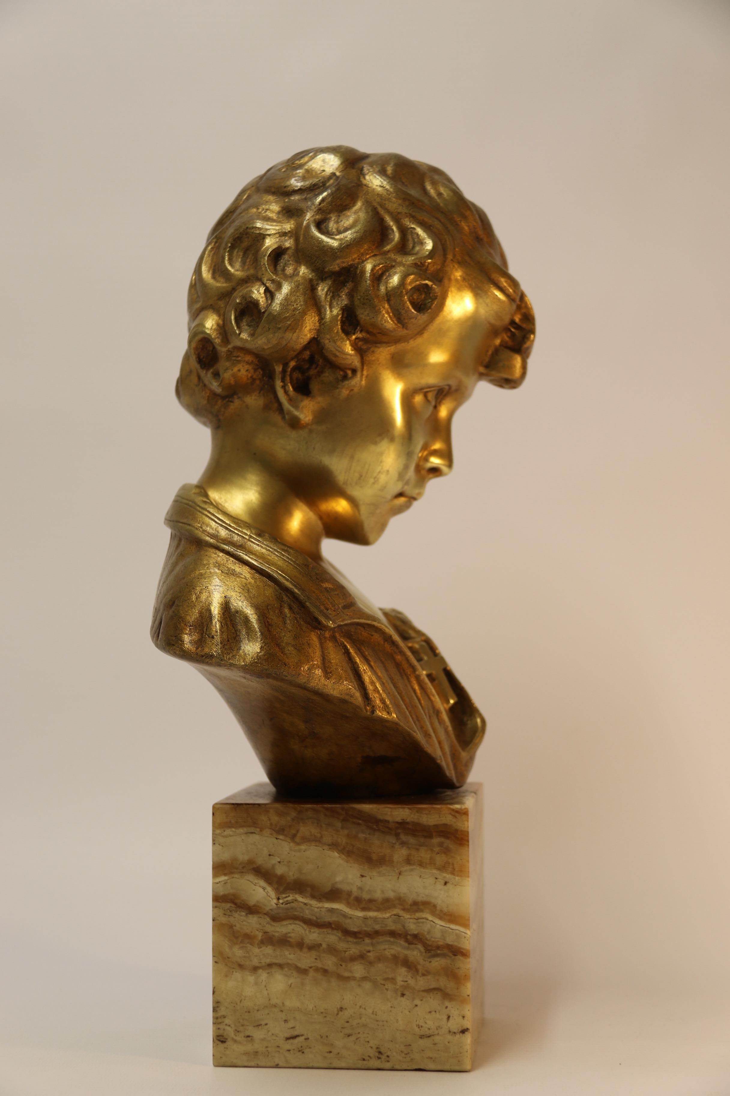 Mid-20th Century Bronze Bust of a Boy on a marble base, signed Donatello, Circa 1930 For Sale