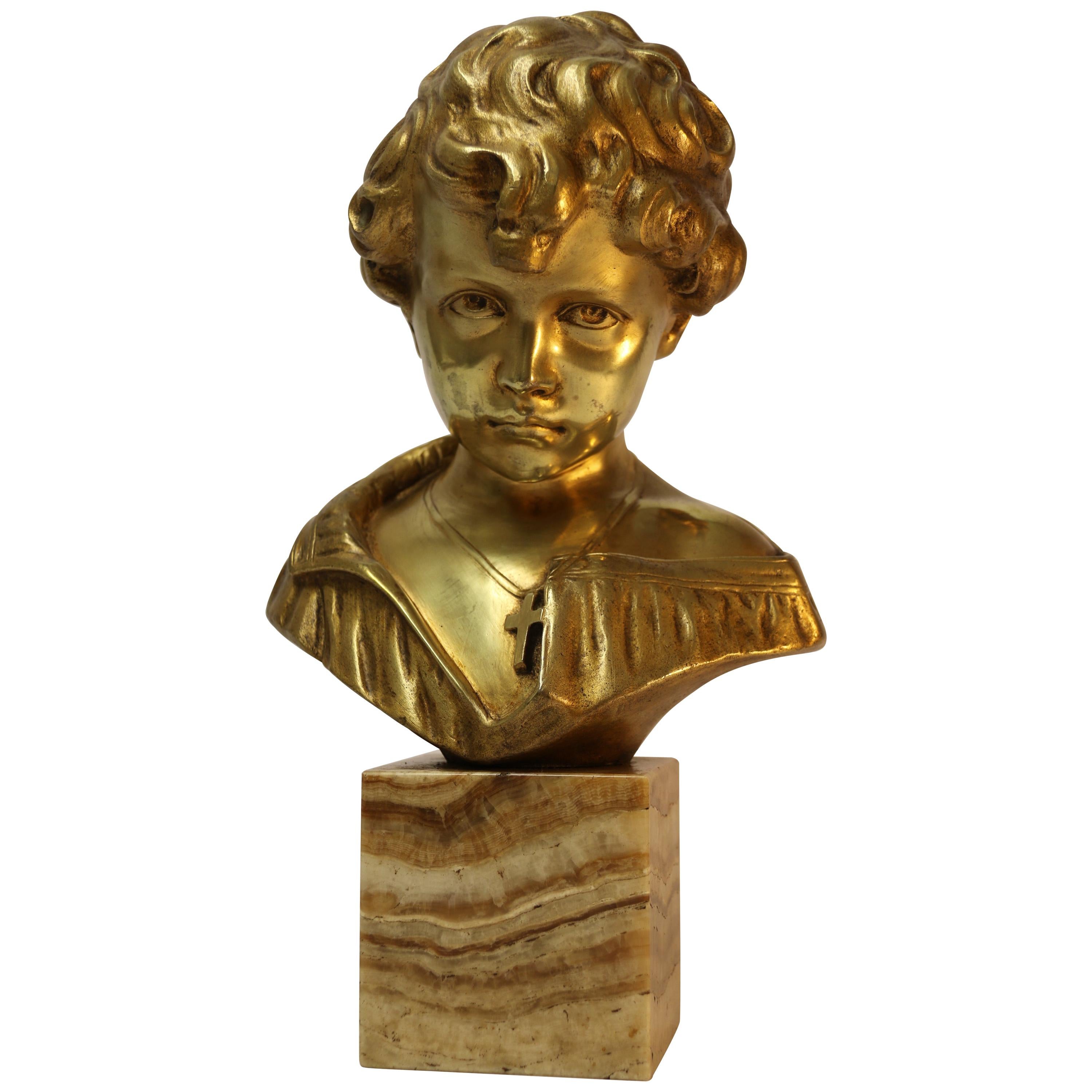 Bronze Bust of a Boy on a marble base, signed Donatello, Circa 1930 For Sale