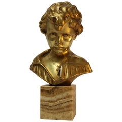 Bronze Bust of a Boy on a marble base, signed Donatello, Circa 1930